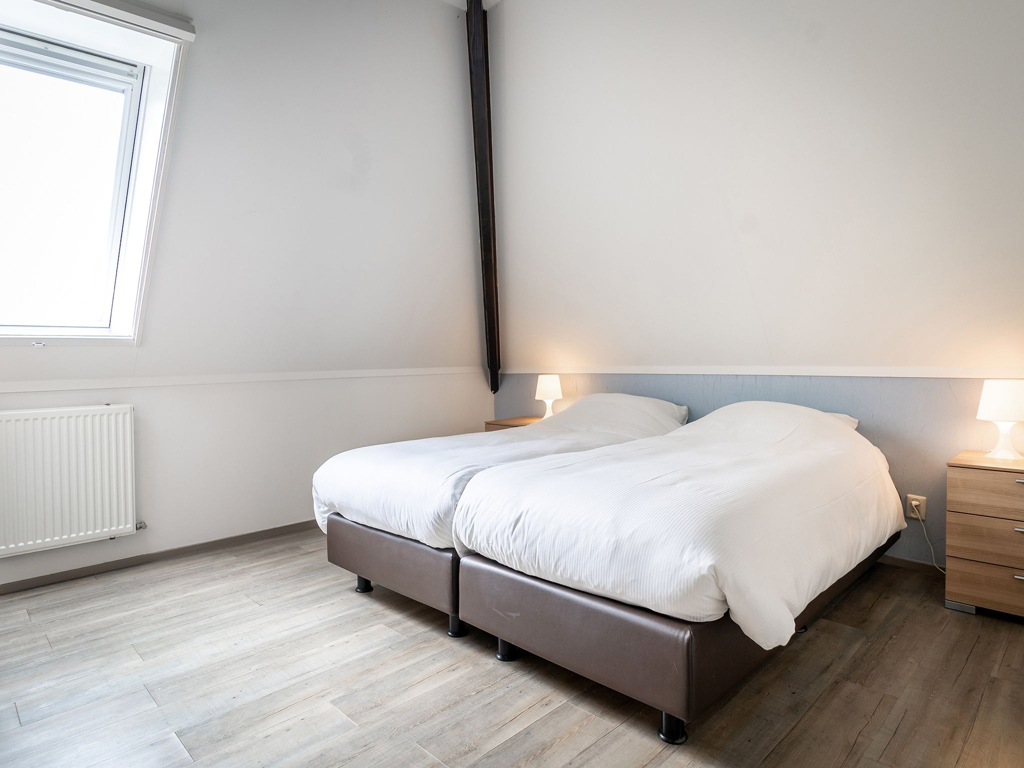 Een slaapkamer van App Hoeve Holland T4 in De Cocksdorp Texel