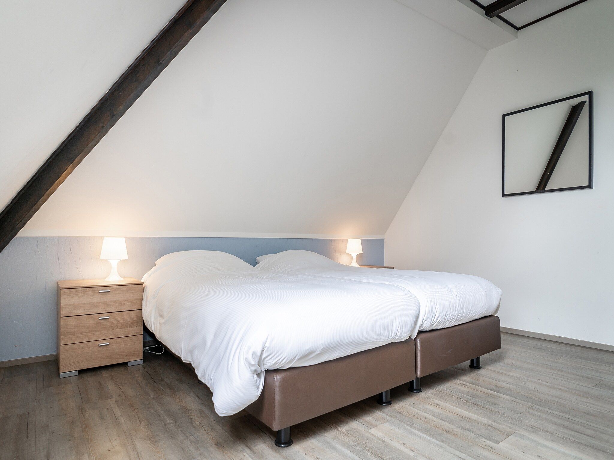 Een slaapkamer van App Hoeve Holland T4 in De Cocksdorp Texel