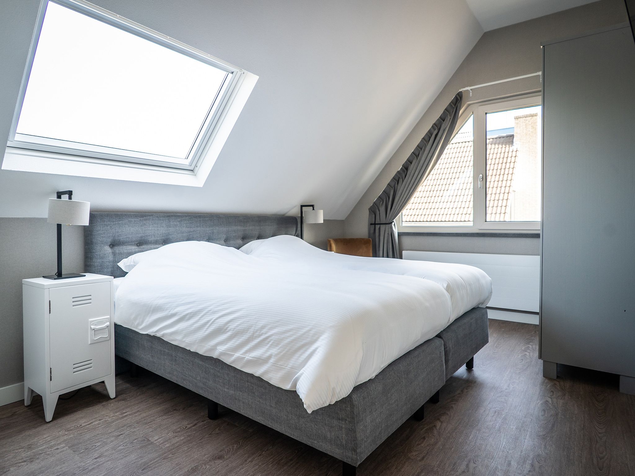 Een slaapkamer van Hodshonstraat B-12 in De Cocksdorp