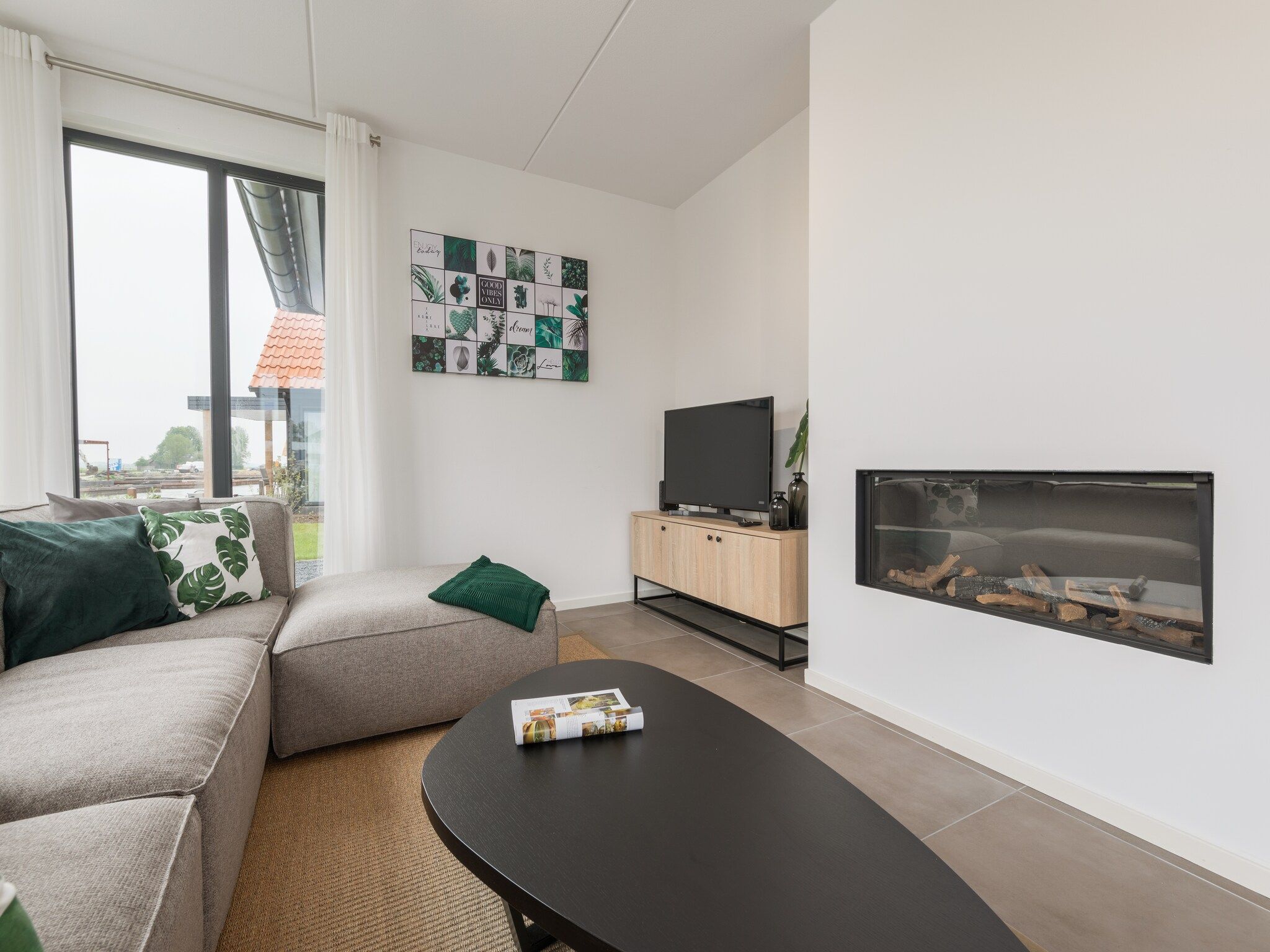 De woonkamer van Waterstaete Ossenzijl 2 in Ossenzijl