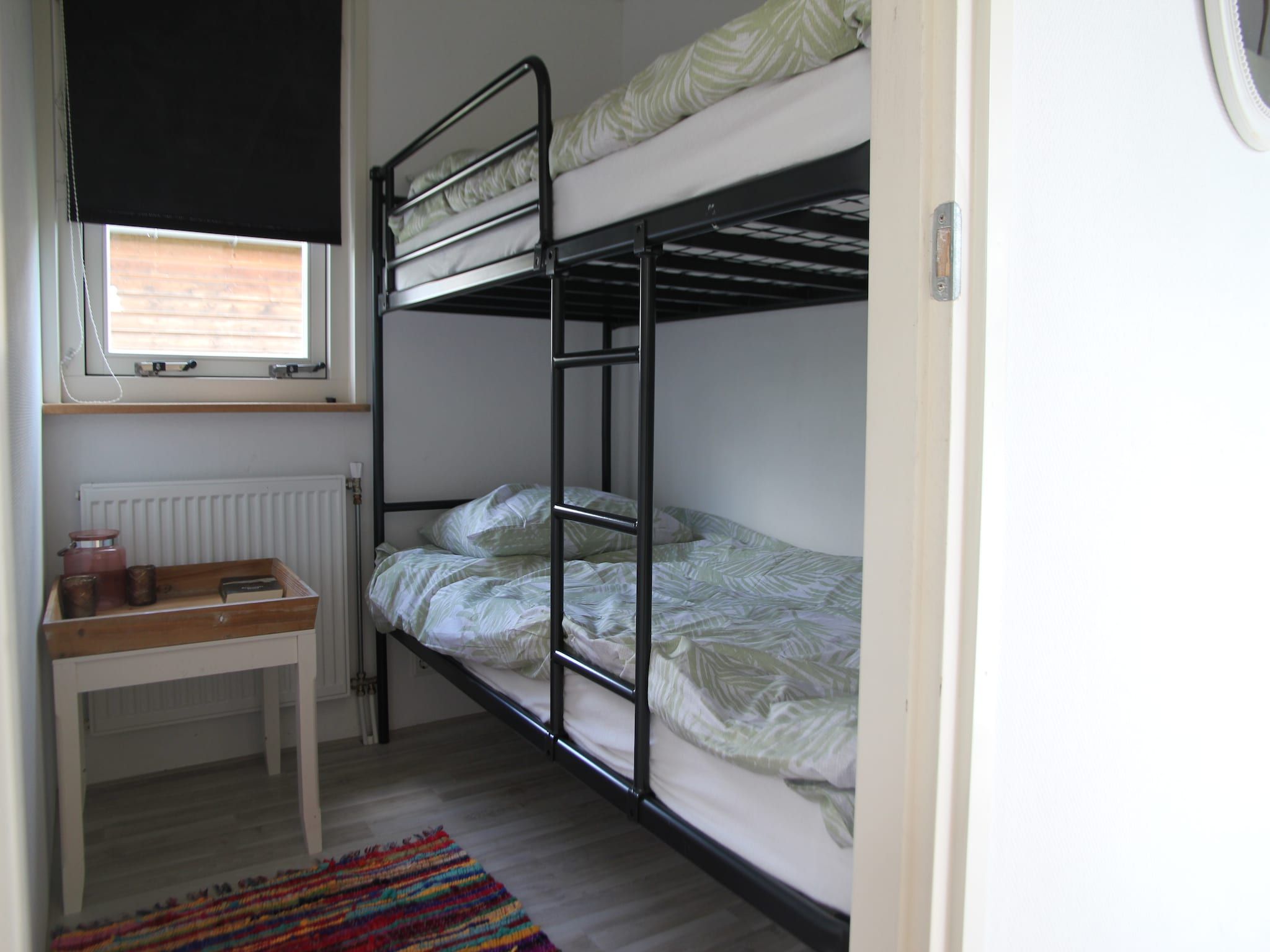 Een slaapkamer van Landelijk bij Zee in Warmenhuizen