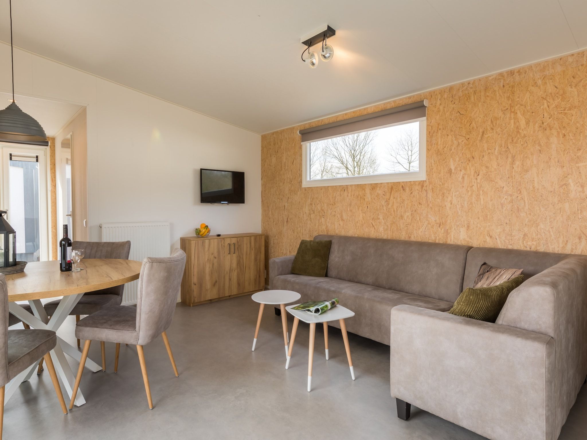 De woonkamer van Vakantiepark Hunzedal 11 in Borger