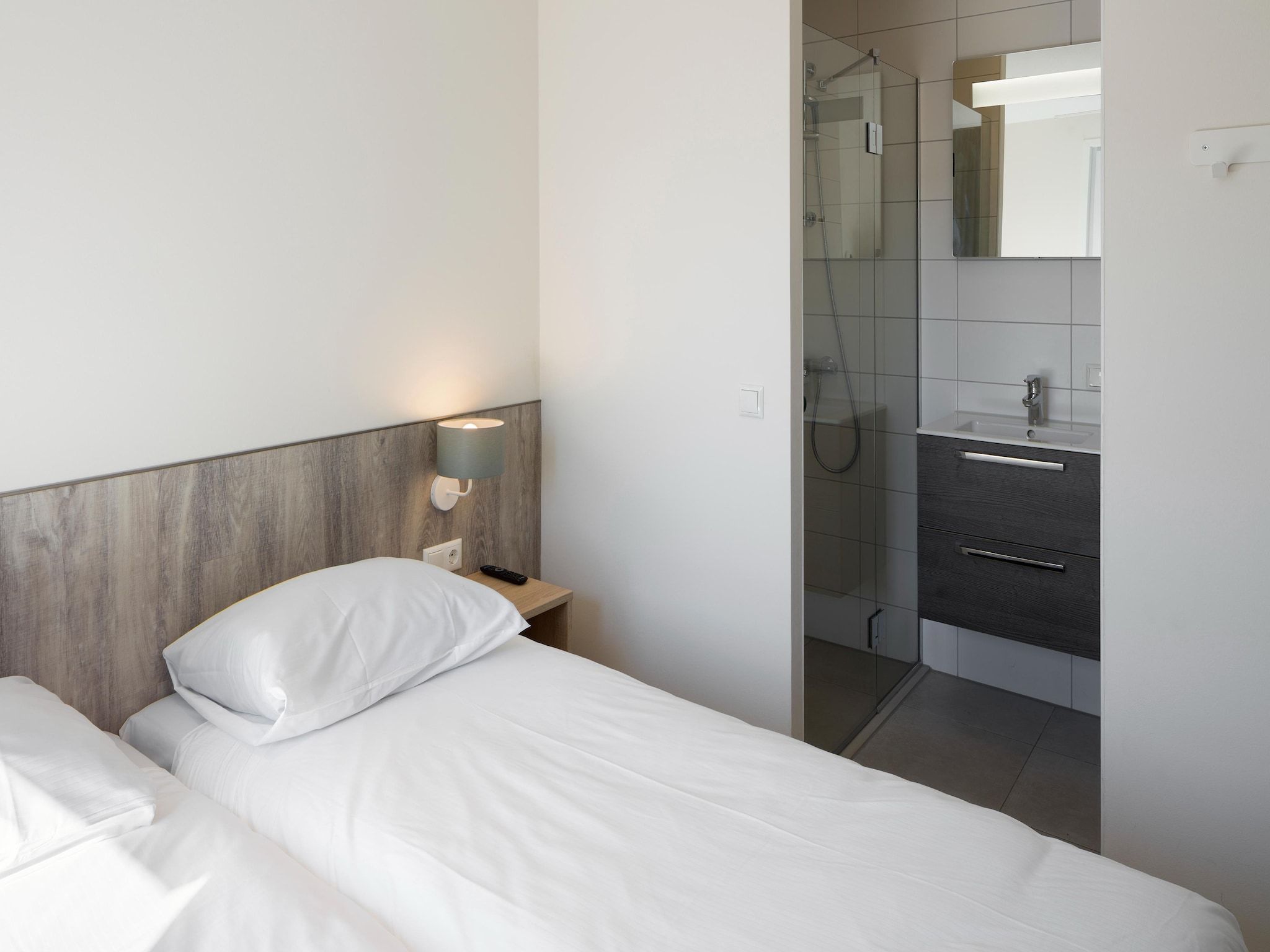 Een slaapkamer van Beach Resort Nieuwvliet-Bad 11 in Nieuwvliet