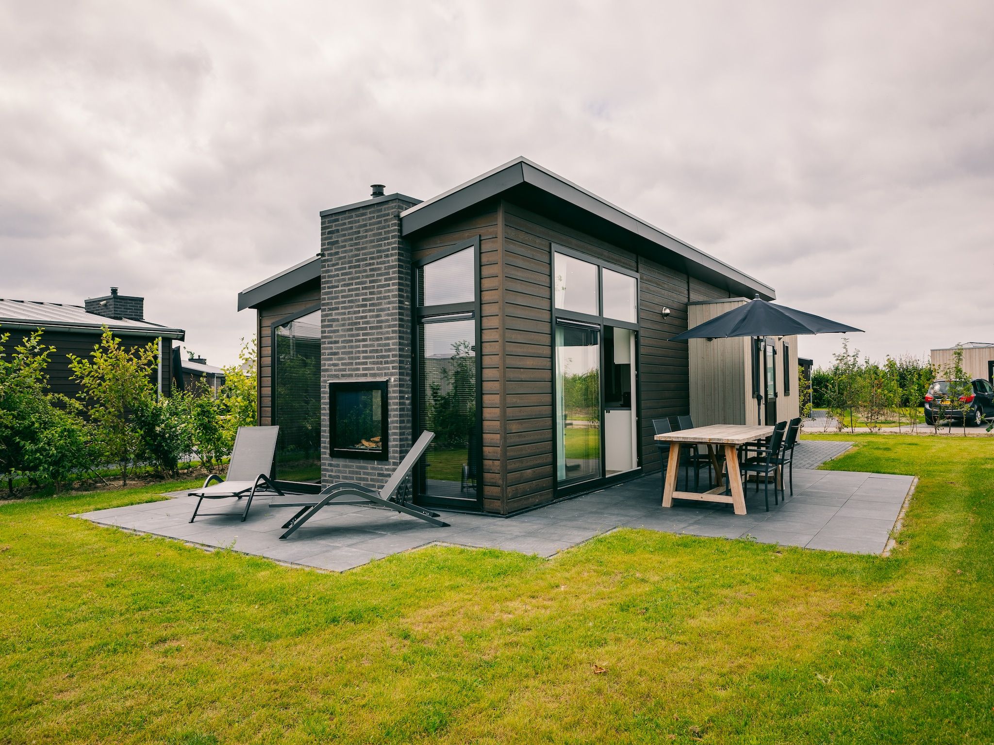 De tuin van Vakantiepark Zeedijk 1 in Herkingen