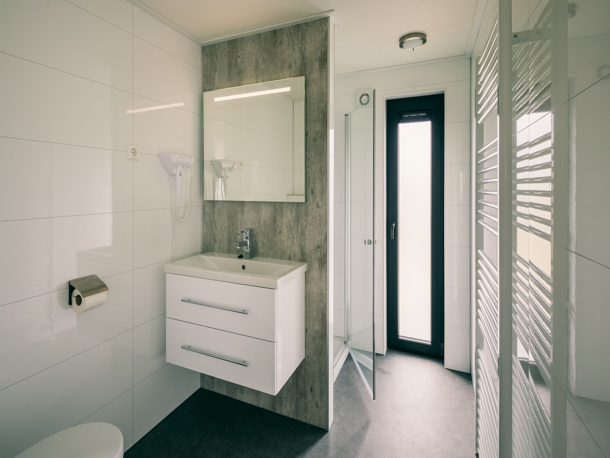 De badkamer van Vakantiepark Zeedijk 3 in Herkingen