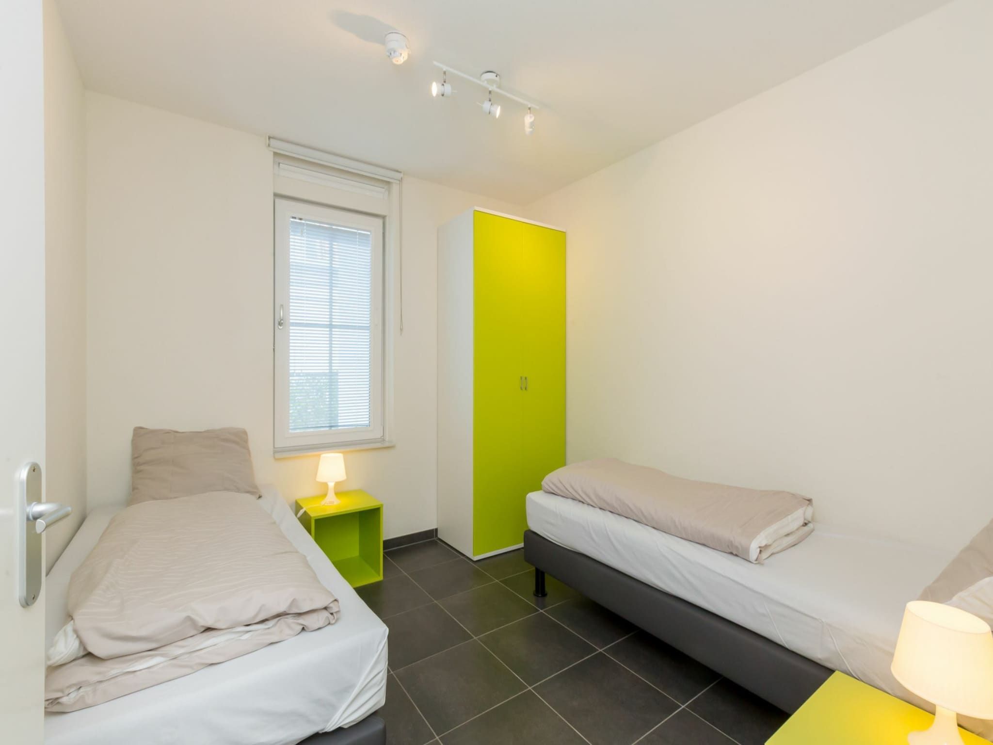 Een slaapkamer van Appartement Duinhof Dishoek 13H - 6 pers de luxe in Koudekerke