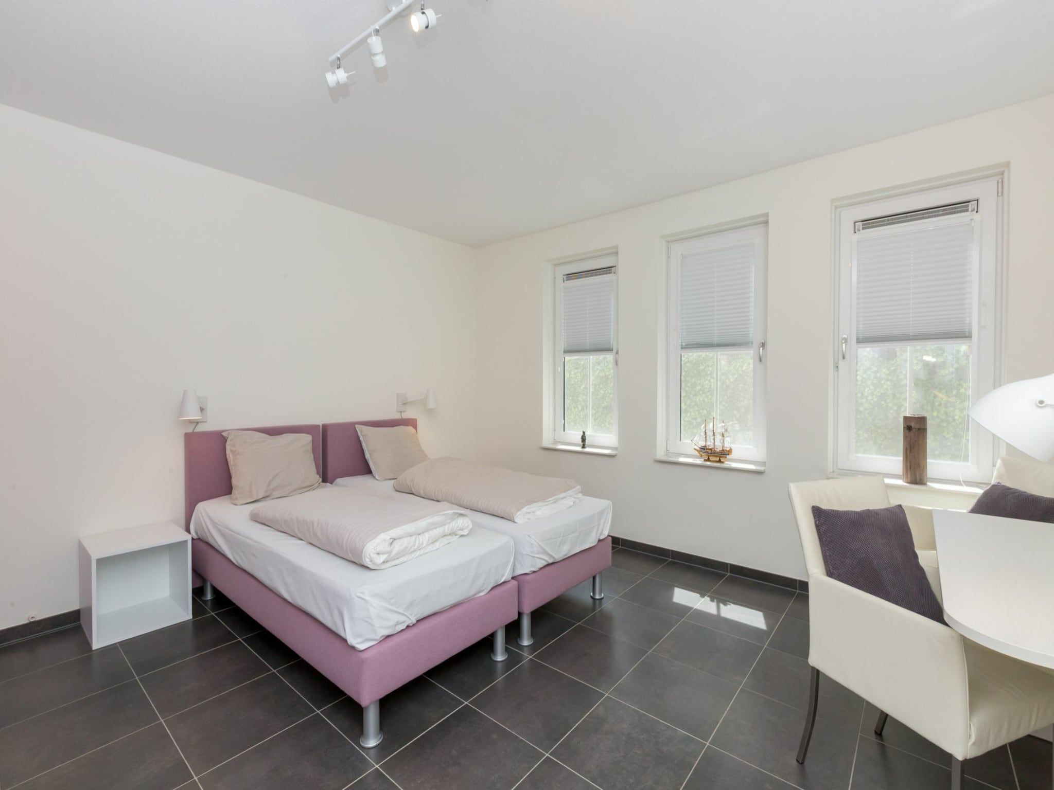 Een slaapkamer van Appartement Duinhof Dishoek 13H - 6 pers de luxe in Koudekerke