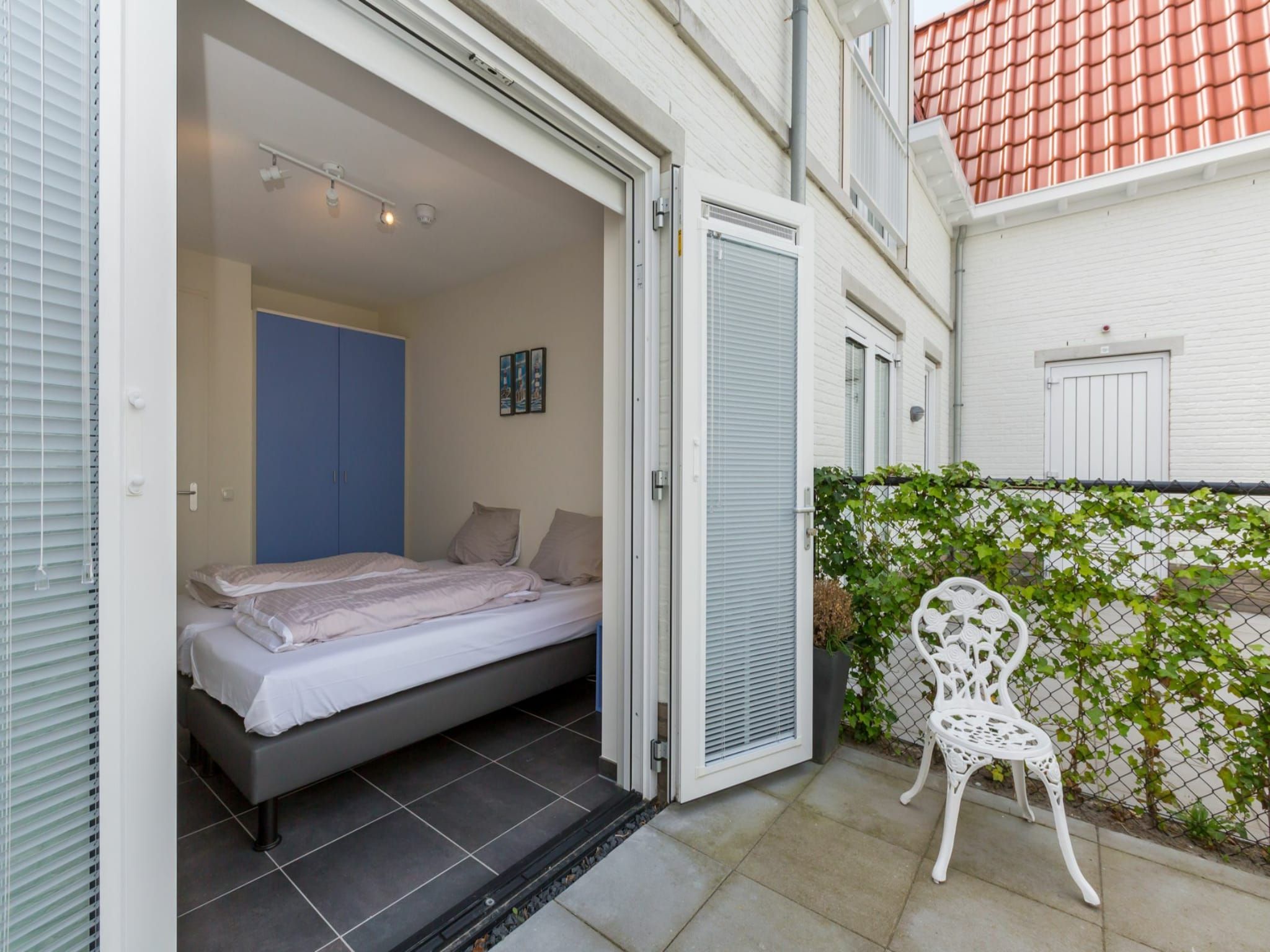 Een slaapkamer van Appartement Duinhof Dishoek 13H - 6 pers de luxe in Koudekerke