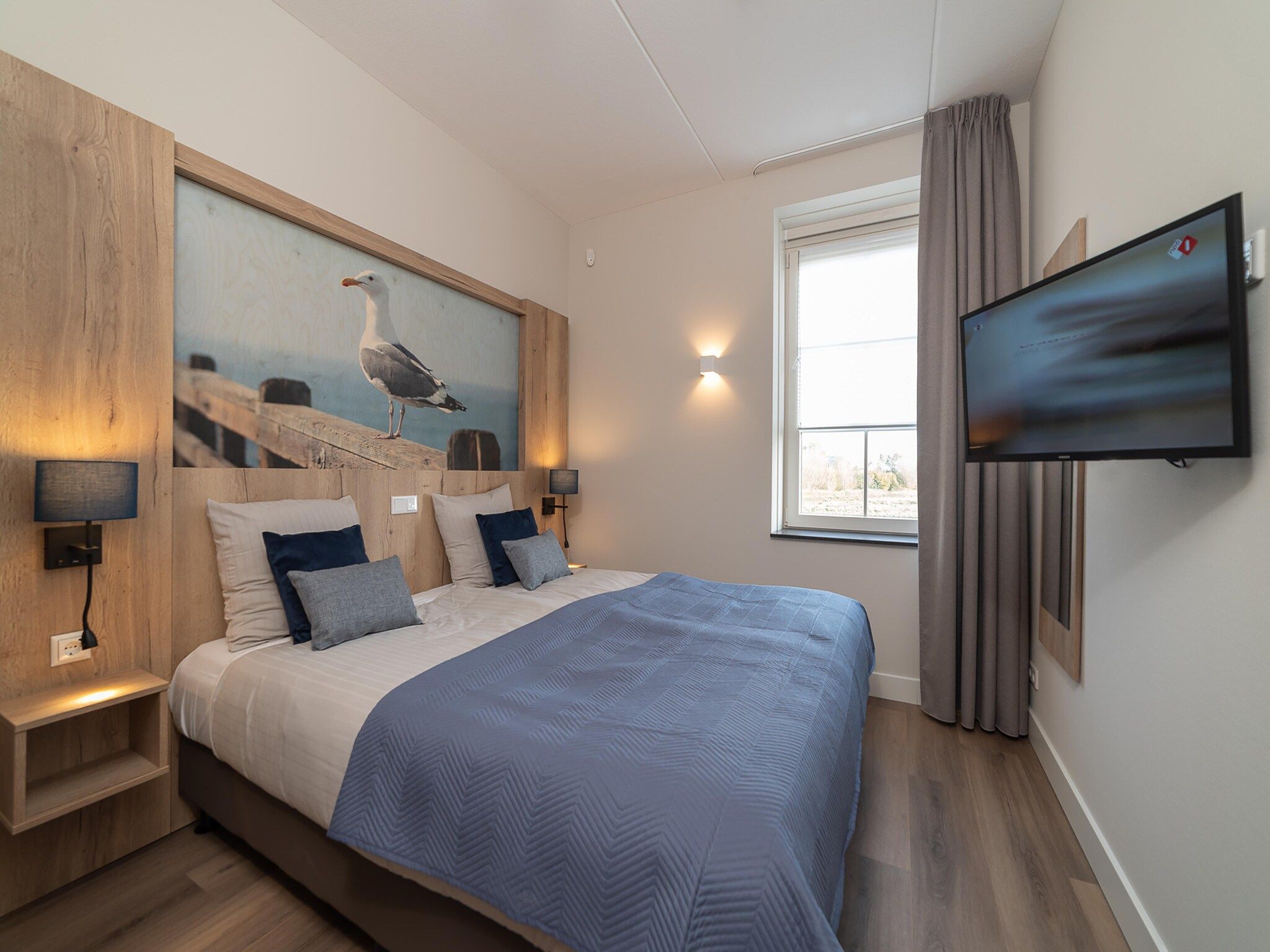 Een slaapkamer van Zeeuwse Parel Appartement 4 pers 1 bdk - 2 in Colijnsplaat