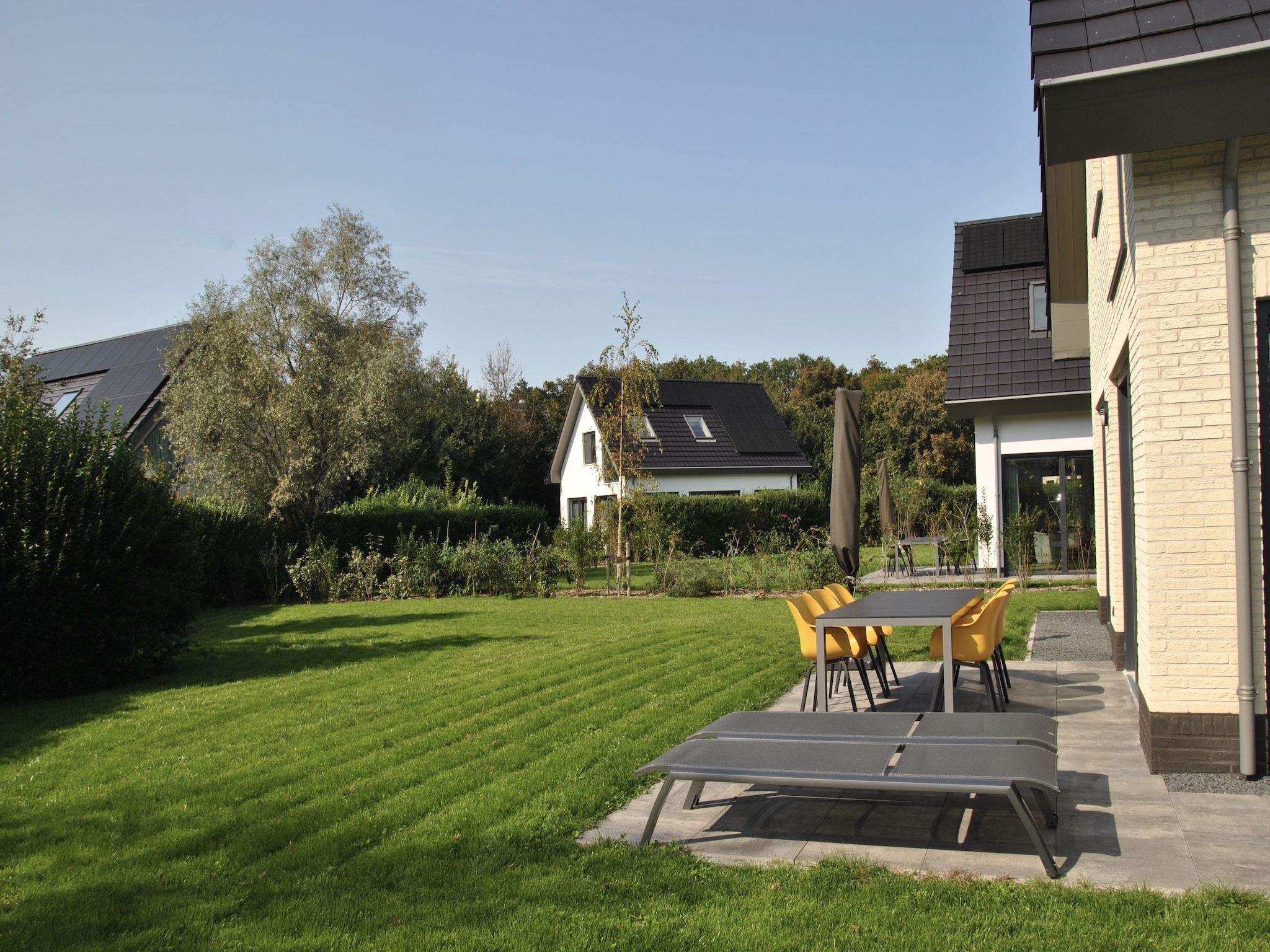 De tuin van De Koog nr 1 - 6 pers woning de luxe in De Koog Texel