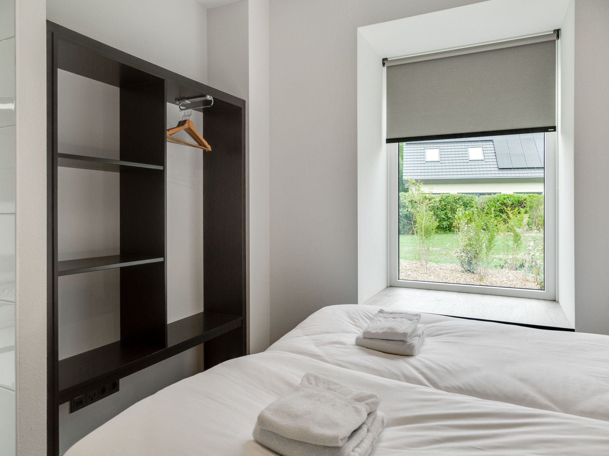 Een slaapkamer van De Koog  nr 4 - 6 pers woning de luxe in De Koog Texel