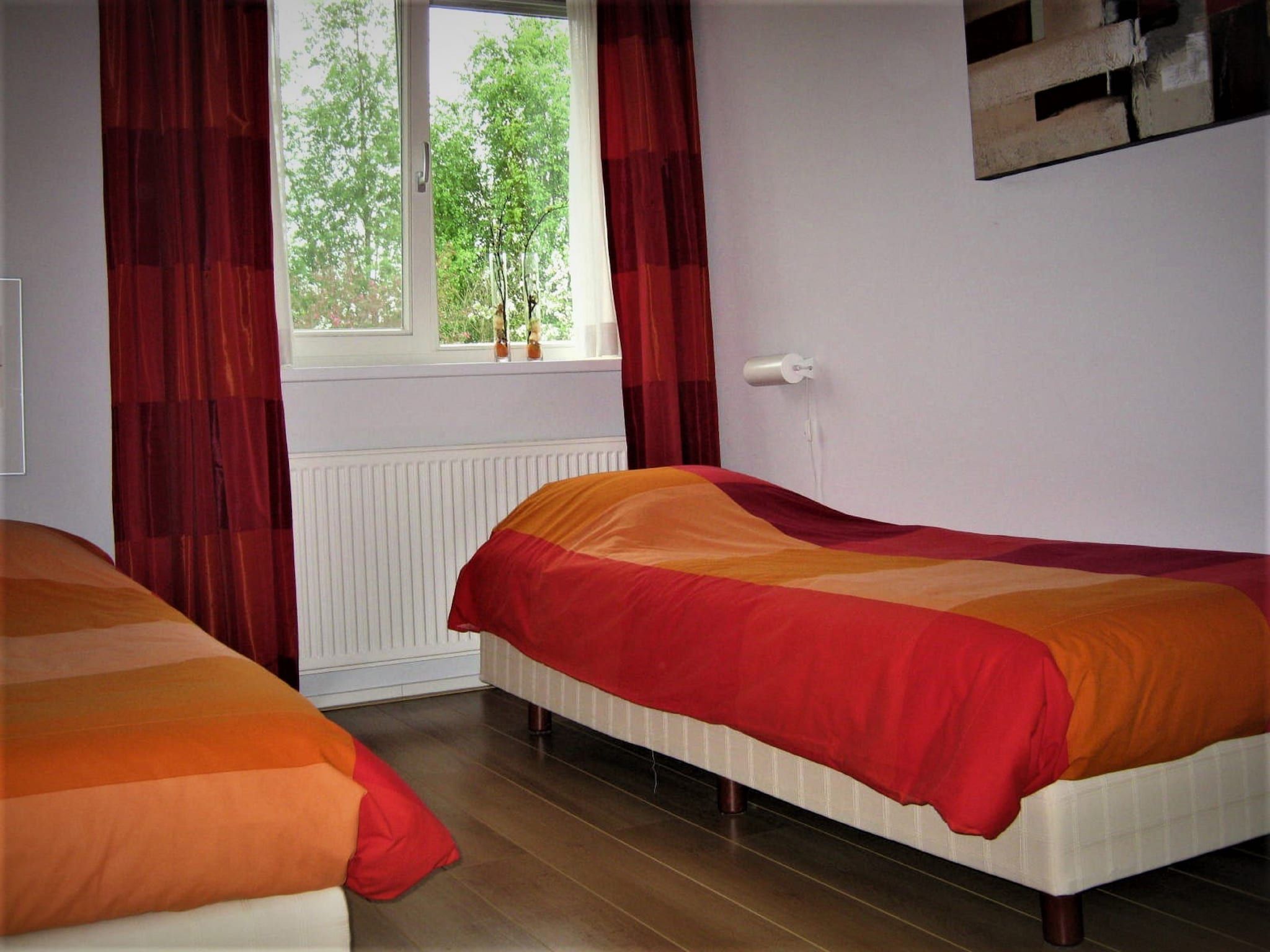 Een slaapkamer van Vakantie appartement De Stelling in Noordwolde