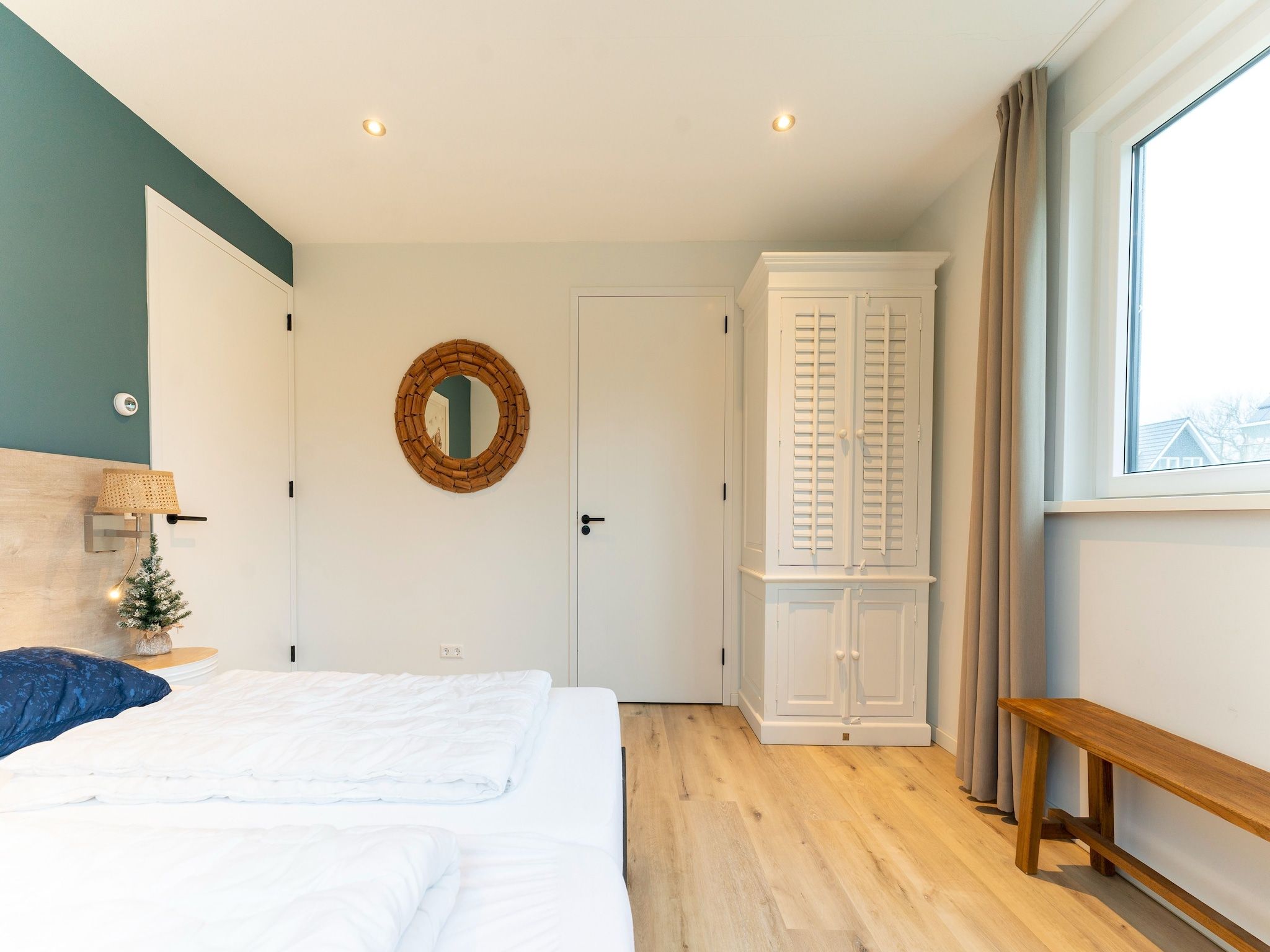 Een slaapkamer van So What 15 in De Koog Texel