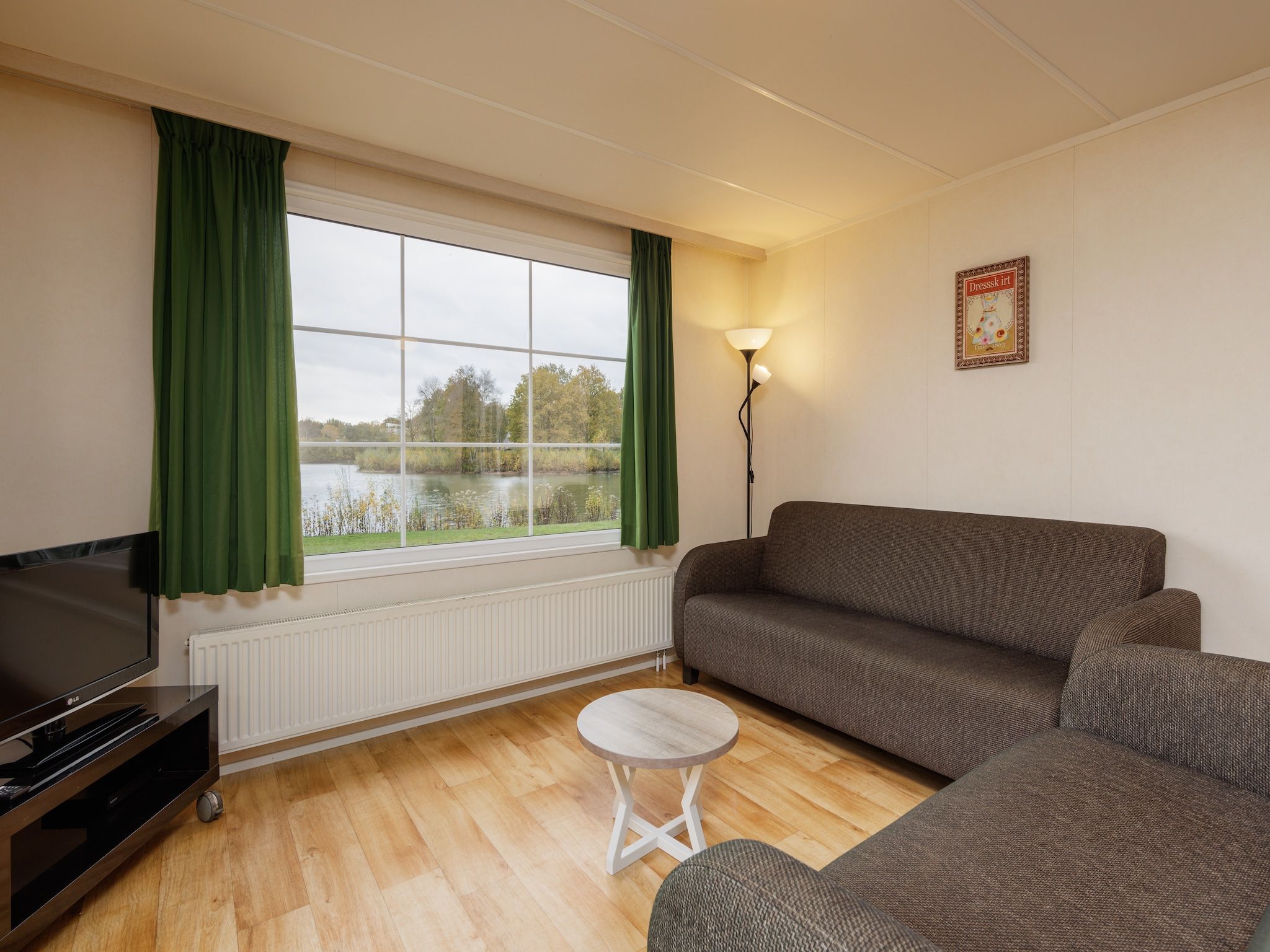 De woonkamer van Vakantiepark Hunzedal 13 in Borger