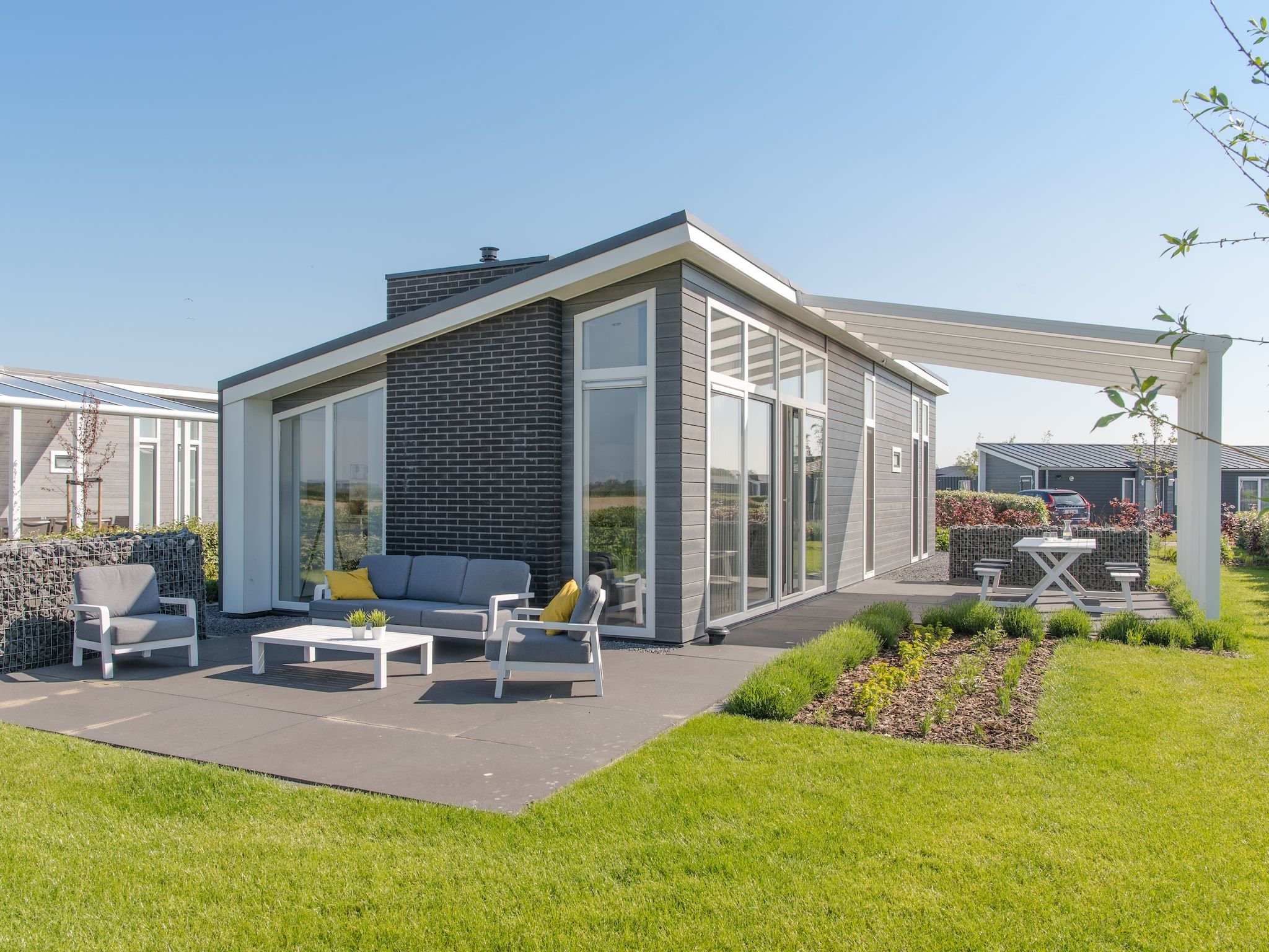 De tuin van Water Resort Oosterschelde 39 in Wemeldinge