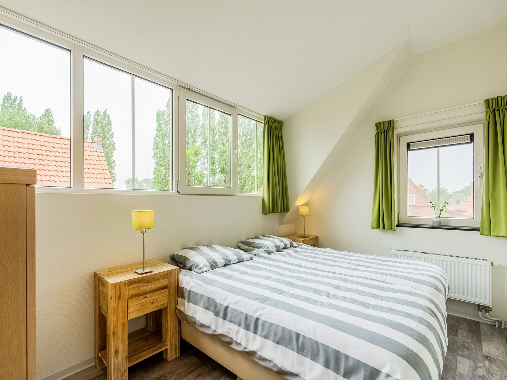 Een slaapkamer van Krokus 18 in Breskens