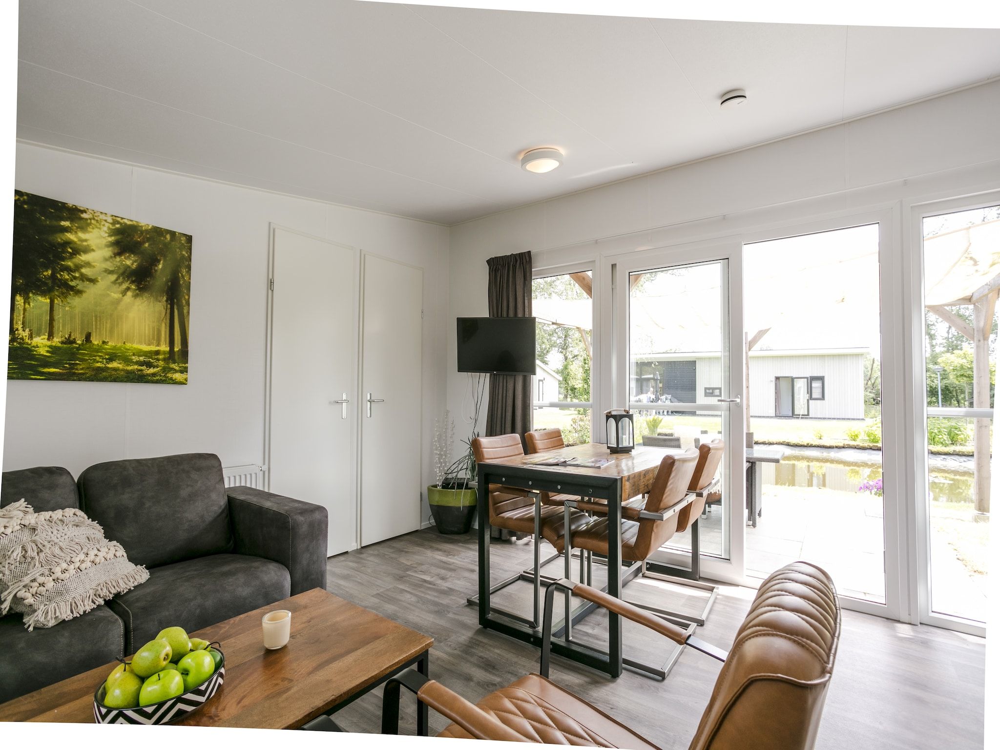De woonkamer van Vakantiepark De Lochemse Berg 2 in Lochem