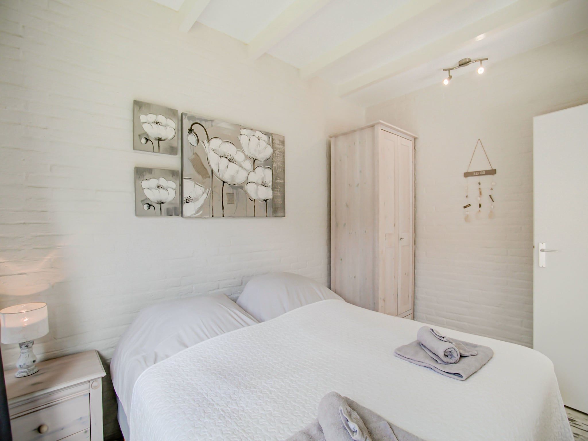 Een slaapkamer van Royal Palm in Noordwijkerhout