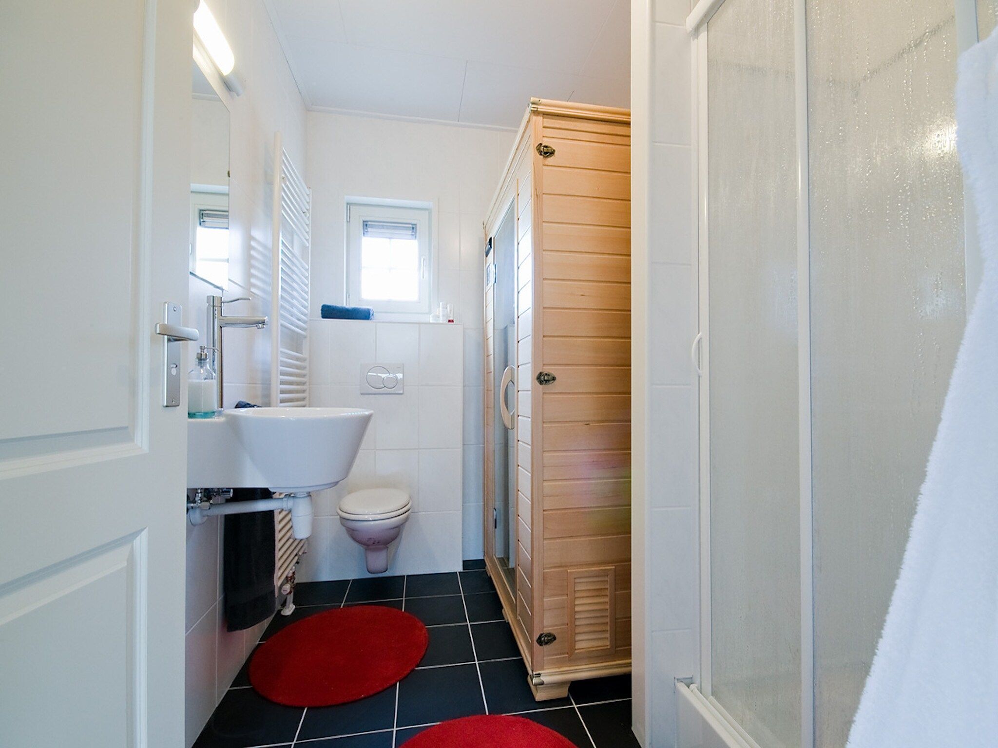 De badkamer van De Grimberghoeve 1 in Notter