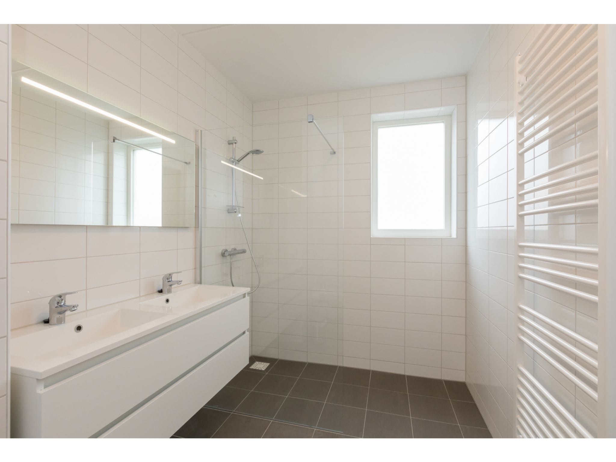 De badkamer van Aparthotel Zoutelande - Luxe 3-persoons appartement in Zoutelande