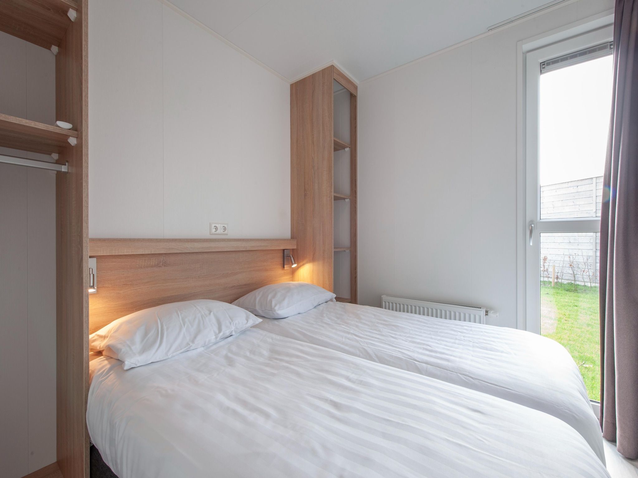 Een slaapkamer van Beach Resort Nieuwvliet-Bad 13 in Nieuwvliet-Bad