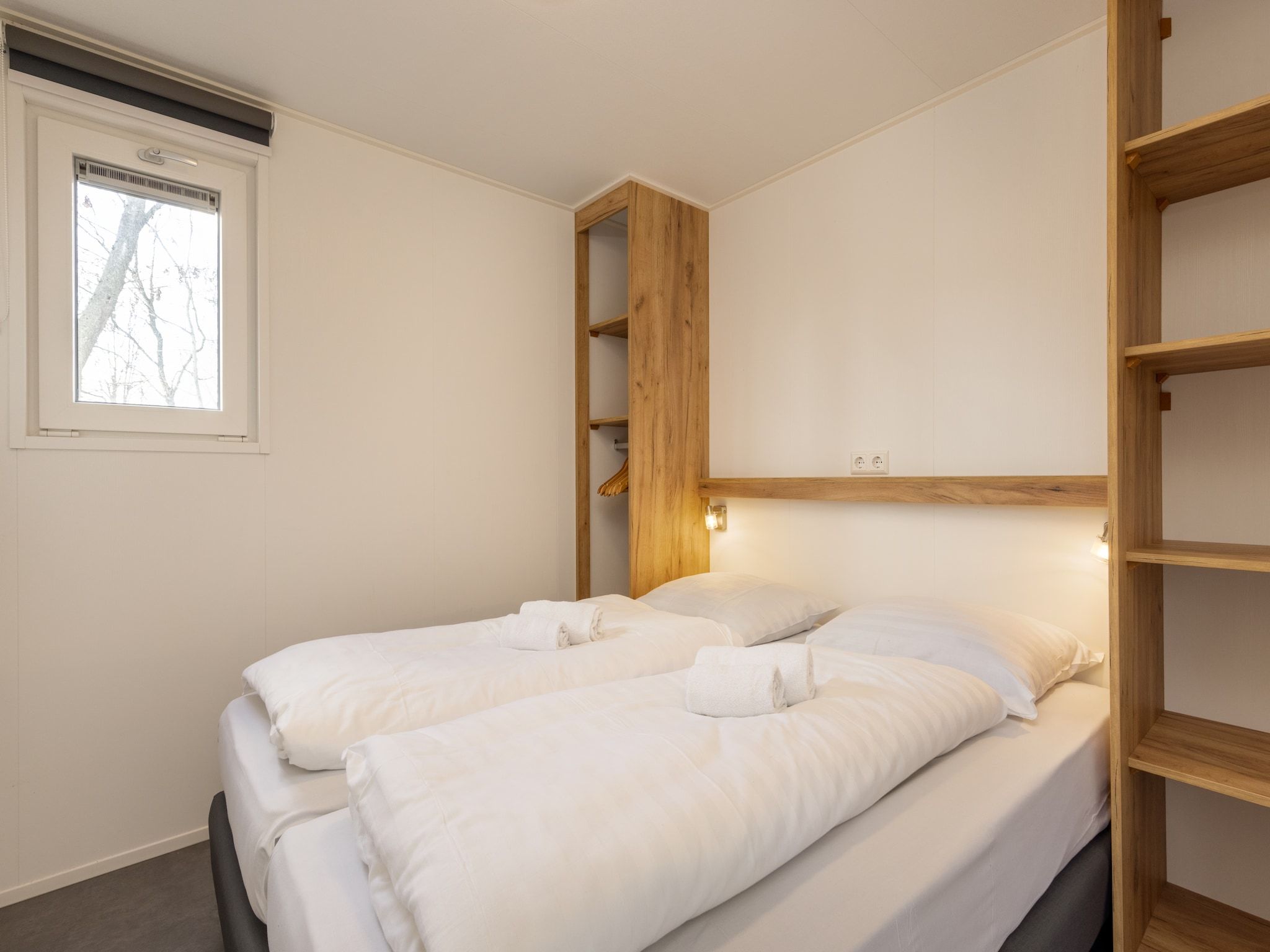 Een slaapkamer van Hunzepark 13 in Gasselternijveen