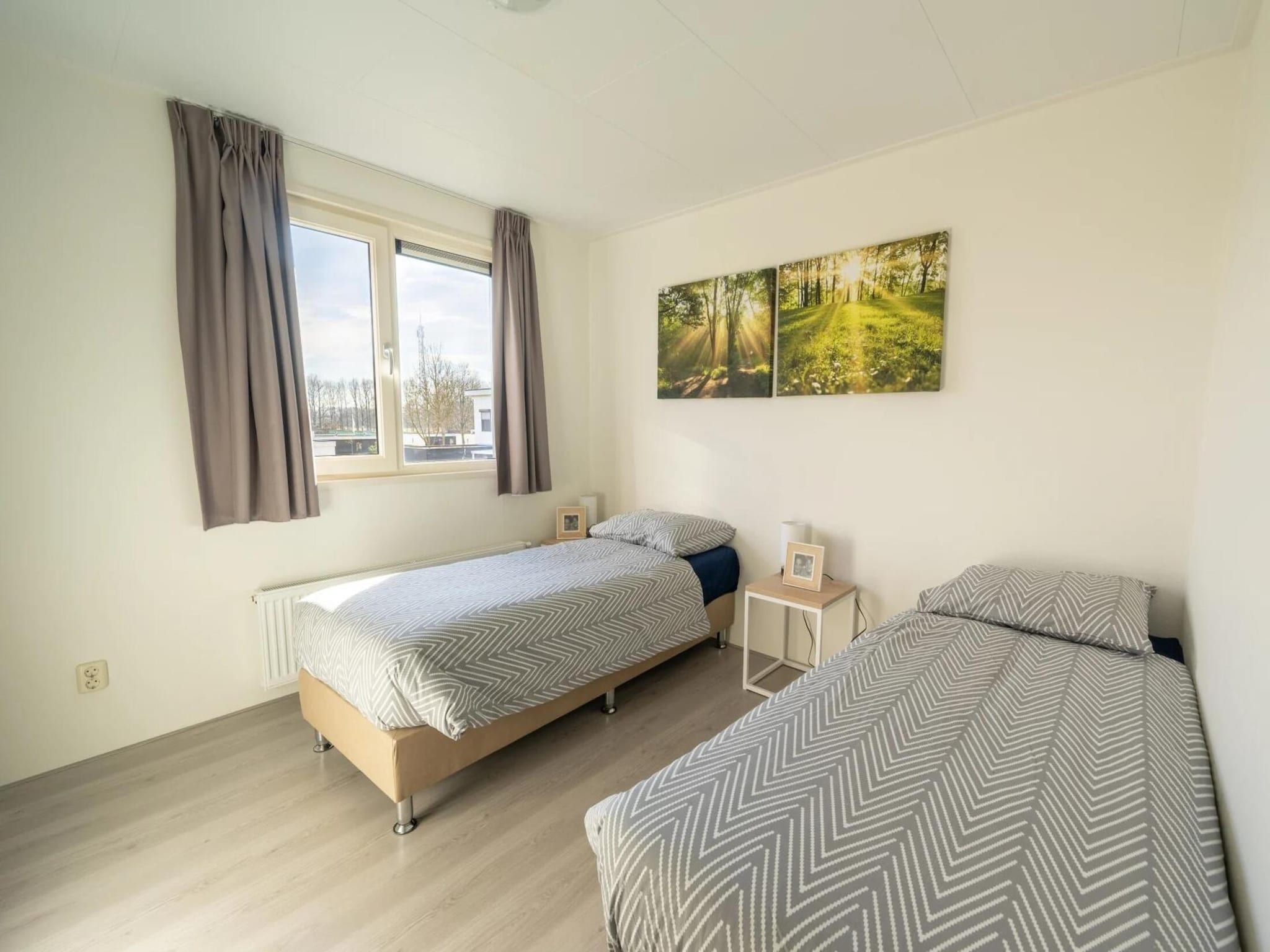 Een slaapkamer van Beemsterdijk  8 personen in West-Graftdijk