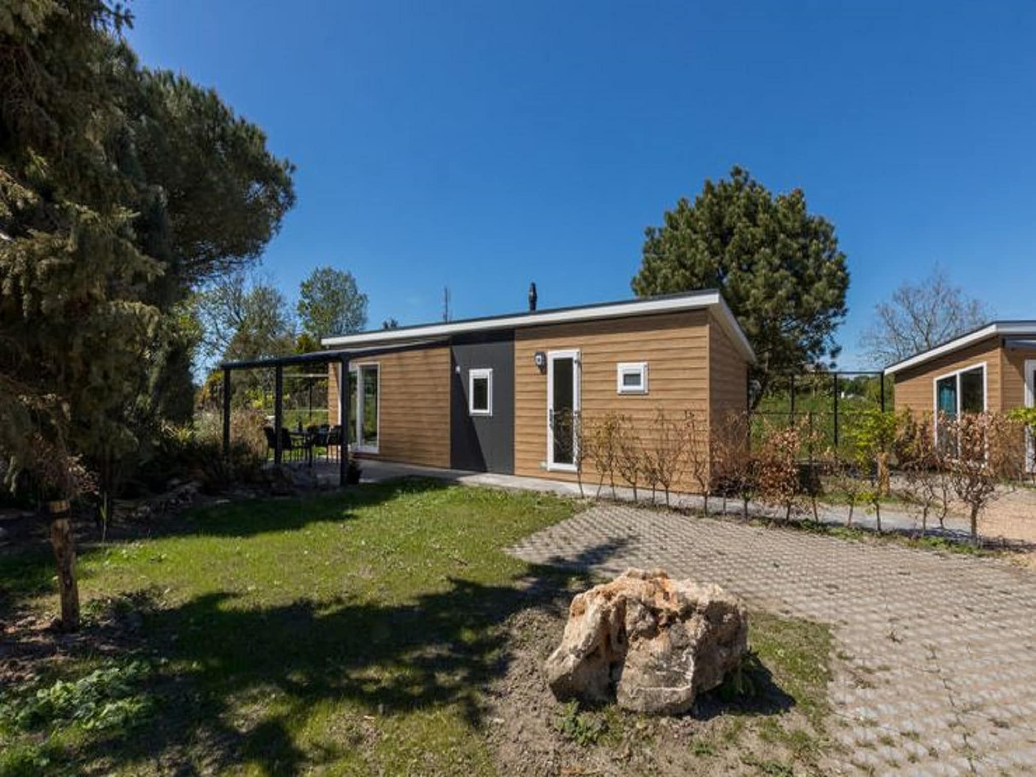 De tuin van Fort den Haak - Chalet 1 tm 15  hond in Vrouwenpolder