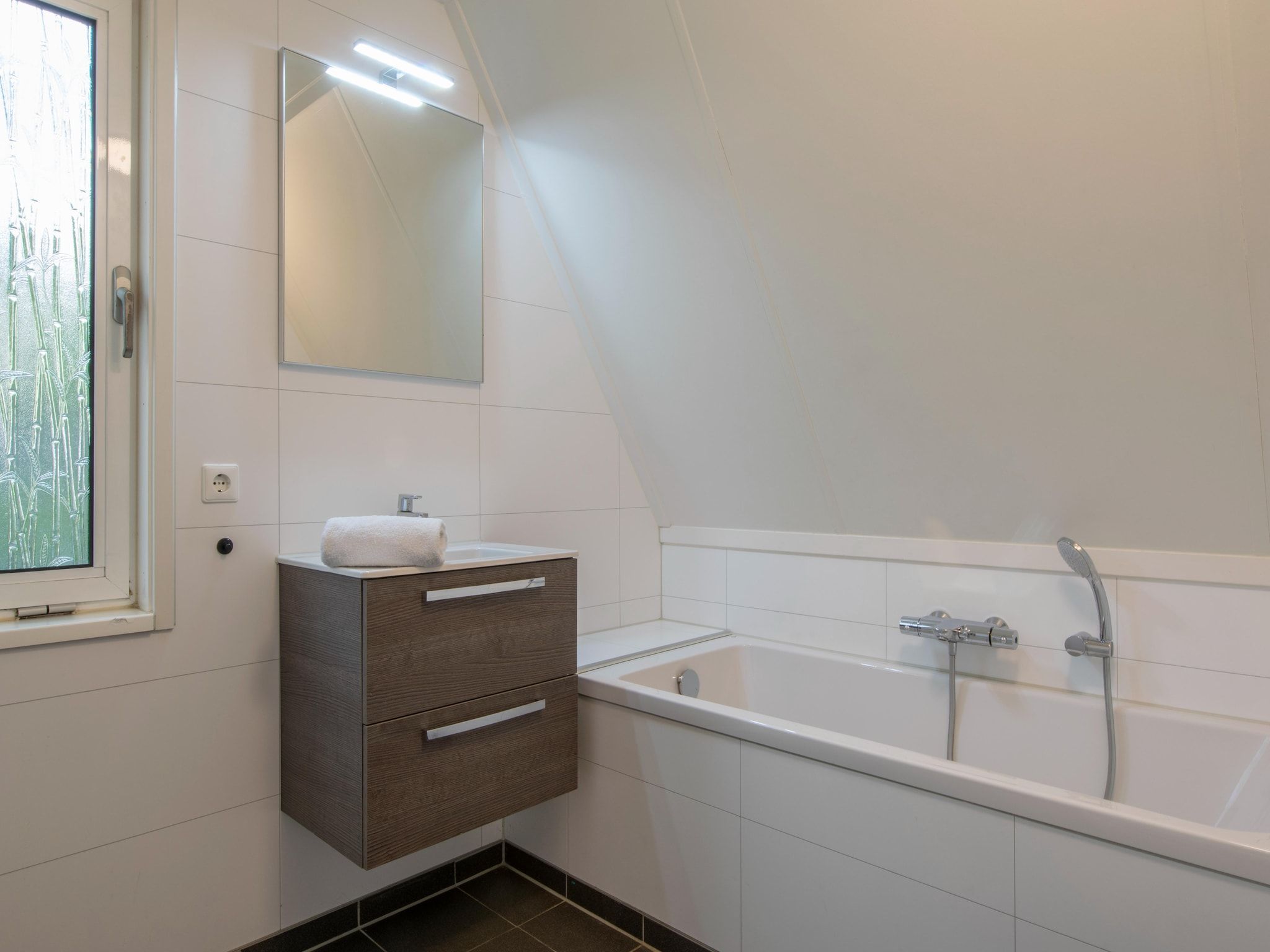 De badkamer van Vakantiepark de Katjeskelder 14 in Oosterhout