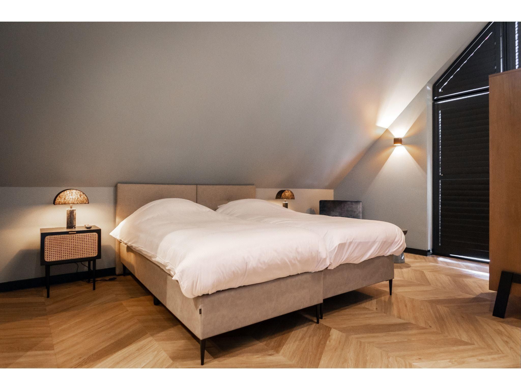 Een slaapkamer van Buytenveldt H1 in De Cocksdorp Texel