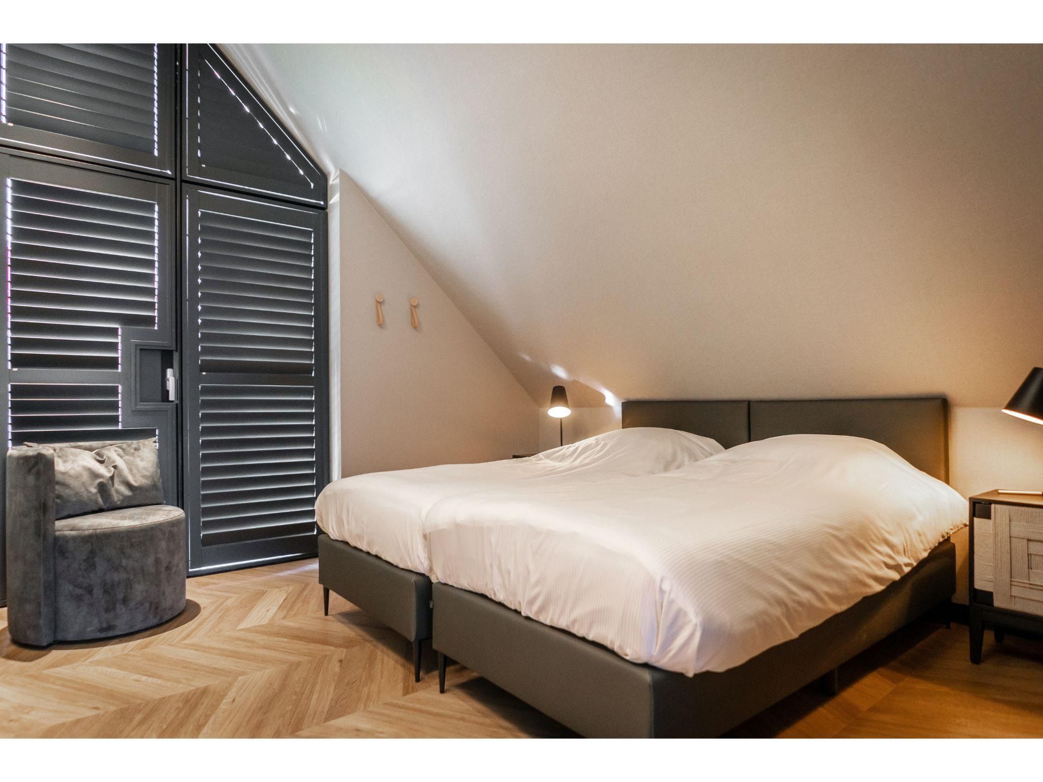 Een slaapkamer van Buytenveldt H1 in De Cocksdorp Texel