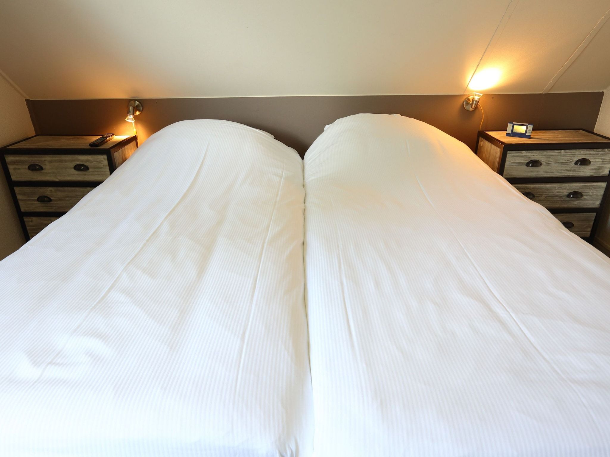 Een slaapkamer van Vakantiepark Emslandermeer 7 in Vlagtwedde