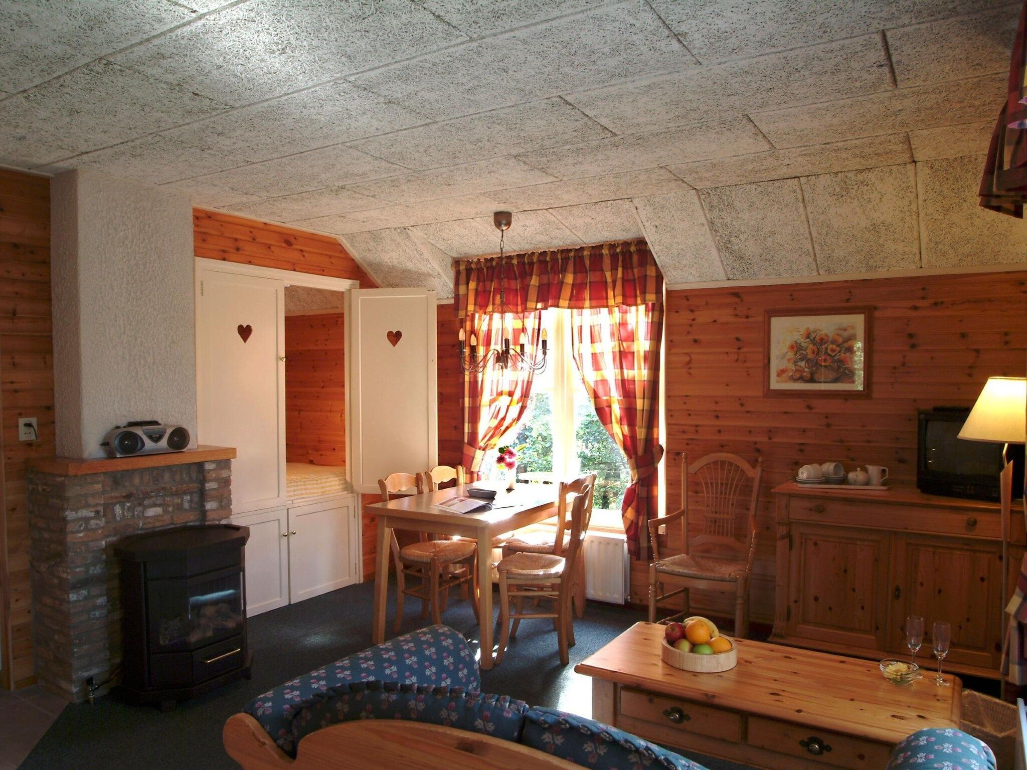De woonkamer van Vakantiepark Herperduin 17 in Herpen