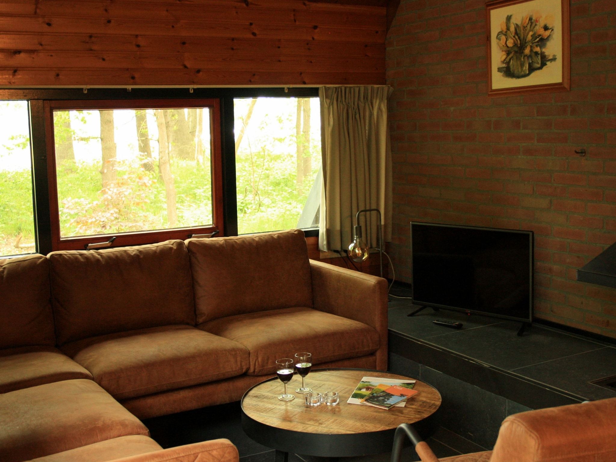 De woonkamer van Vakantiepark Herperduin 19 in Herpen