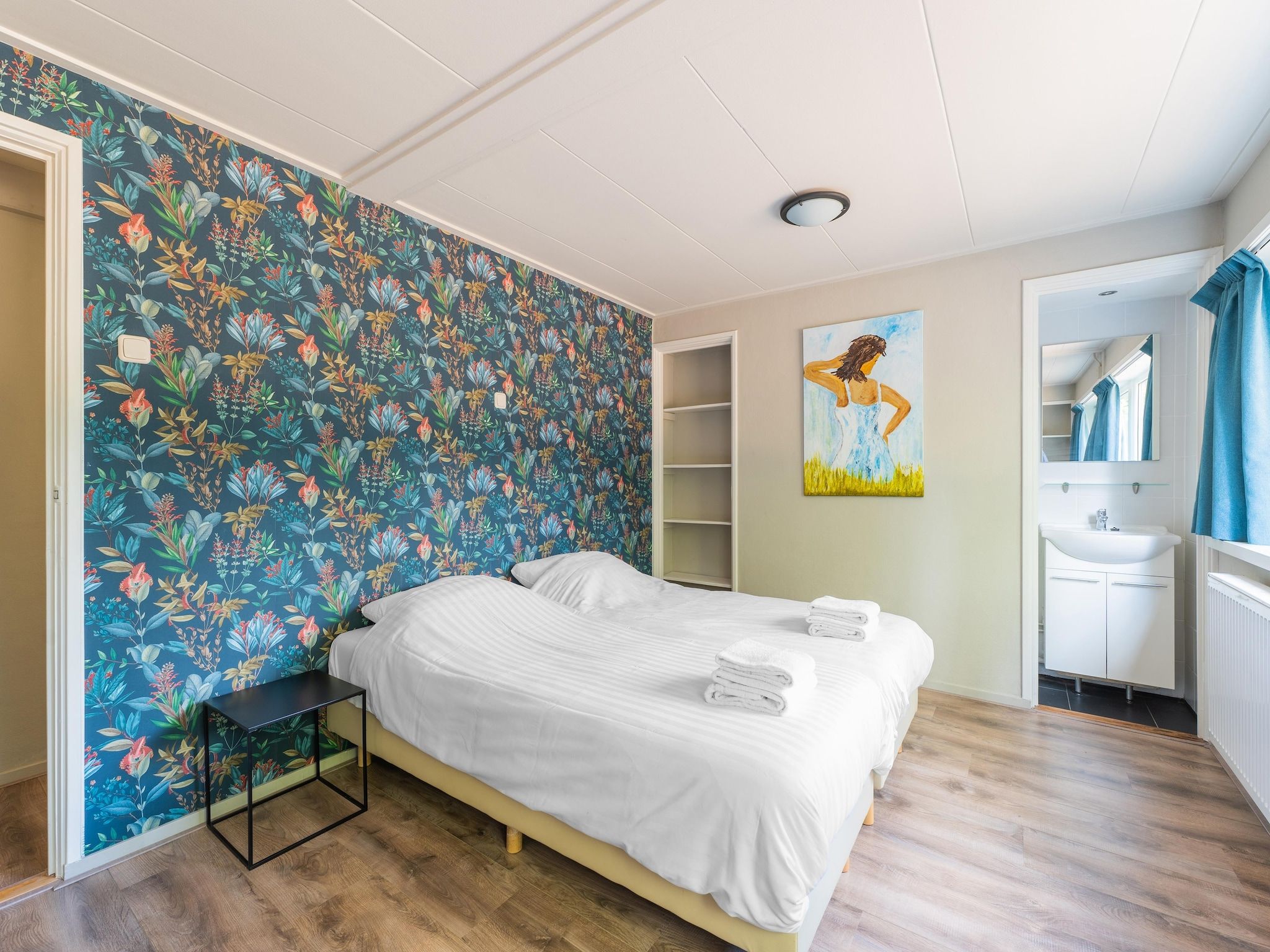 Een slaapkamer van Familiehuis Ruighenrode in Lochem