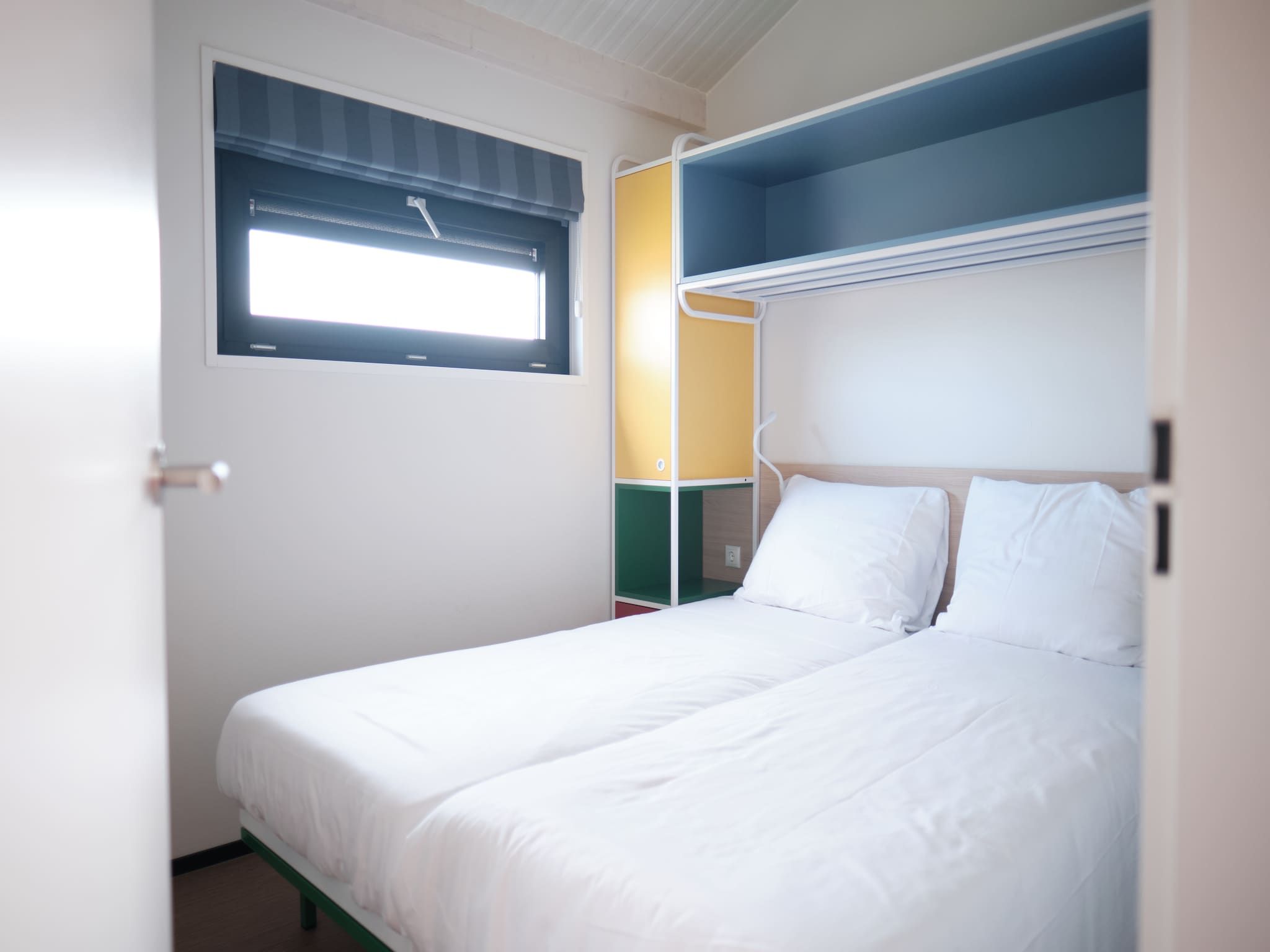 Een slaapkamer van Resort Callantsoog 2 in Callantsoog