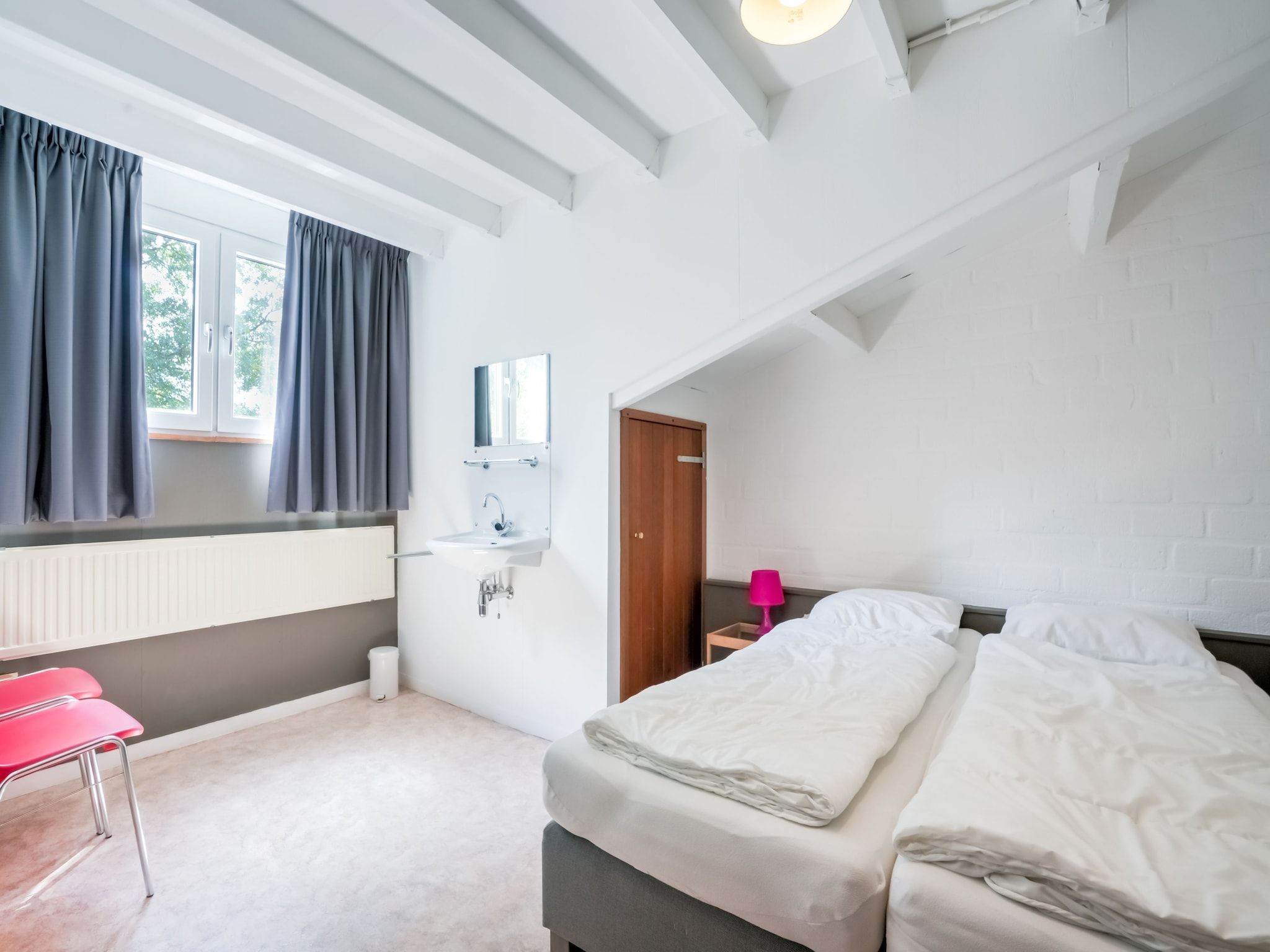 Een slaapkamer van Waterval 8P in Ulestraten