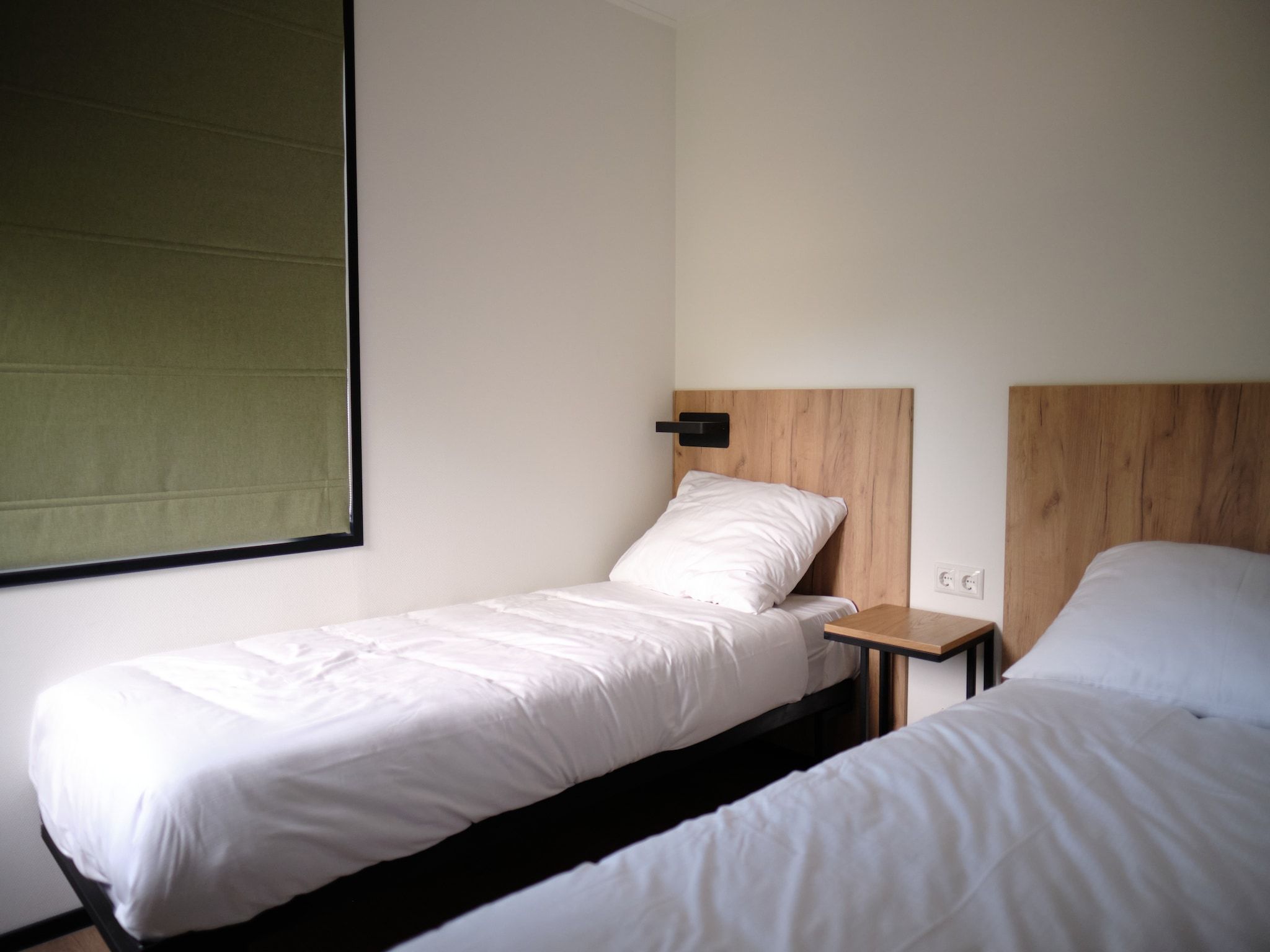 Een slaapkamer van Resort Gulpen 8 in Gulpen