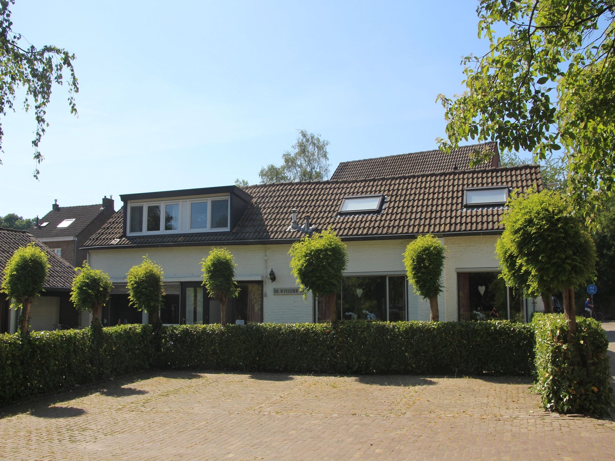 De buitenkant van De Wingerd 10P in Ulestraten