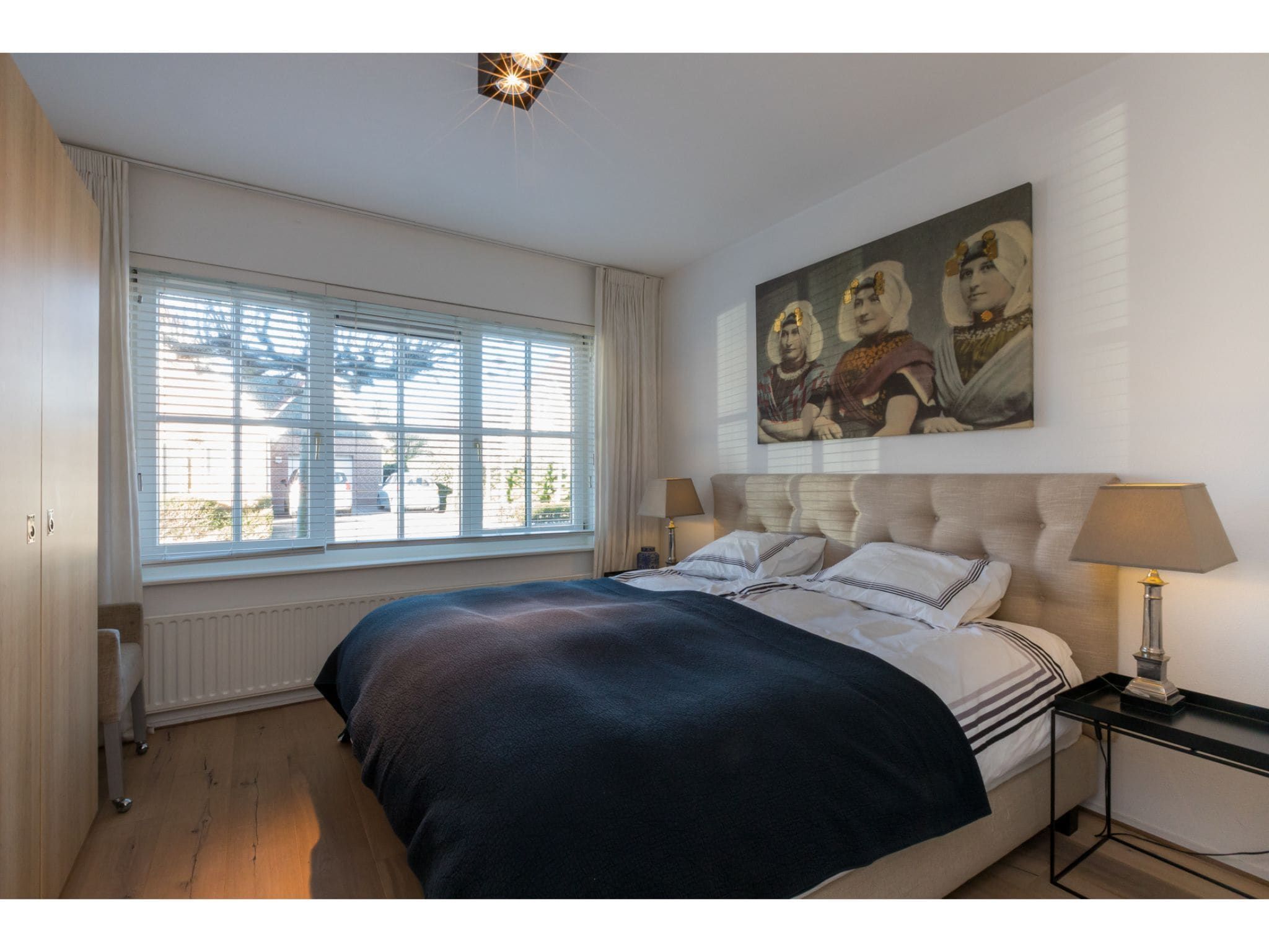 Een slaapkamer van Appartement - Borné  Zoutelande in Zoutelande