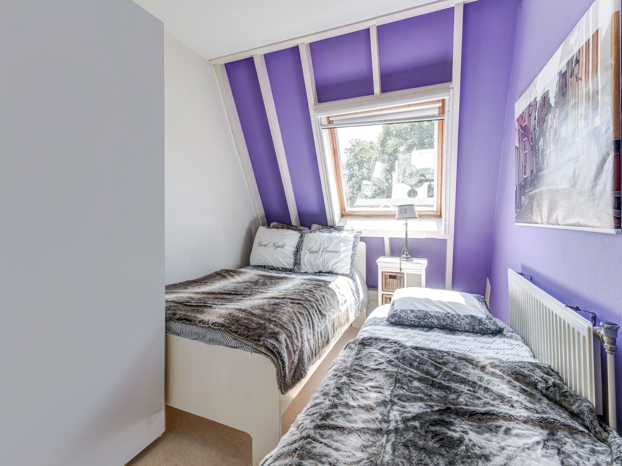 Een slaapkamer van Gezellig  appartement in centrum Leeuwarden in Leeuwarden