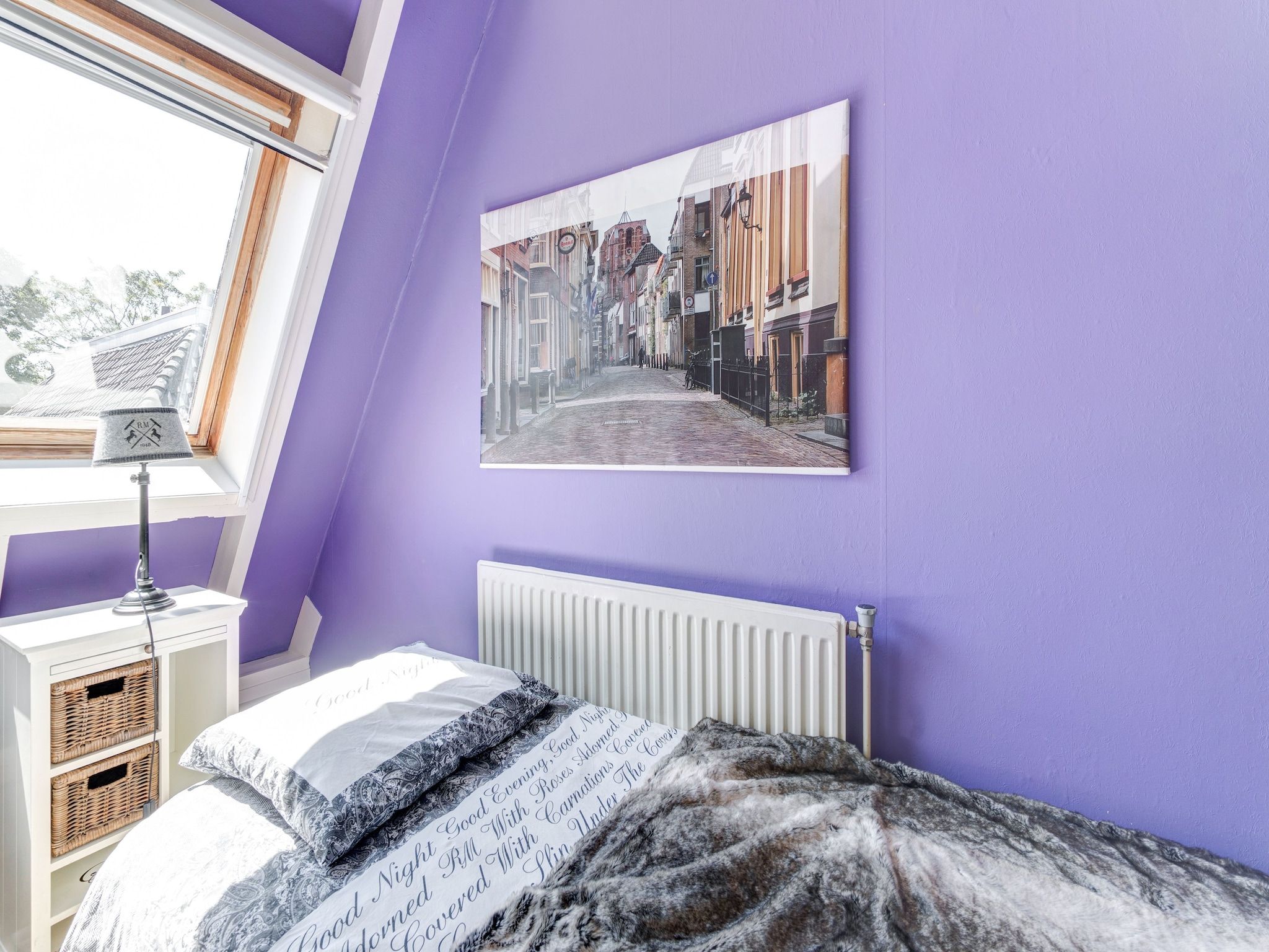 Een slaapkamer van Gezellig  appartement in centrum Leeuwarden in Leeuwarden