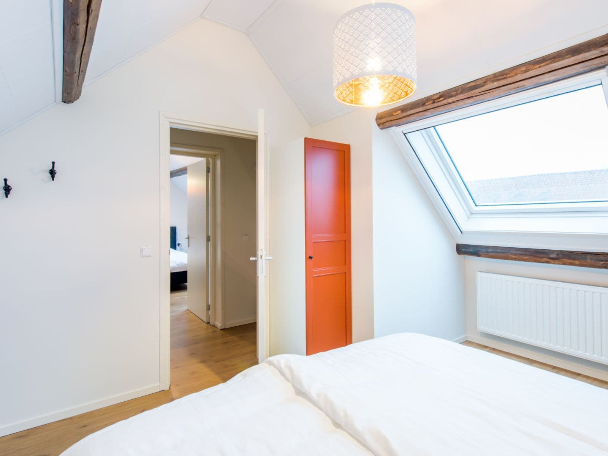 Een slaapkamer van Zoutelandseweg 2 Biggekerke in Biggekerke