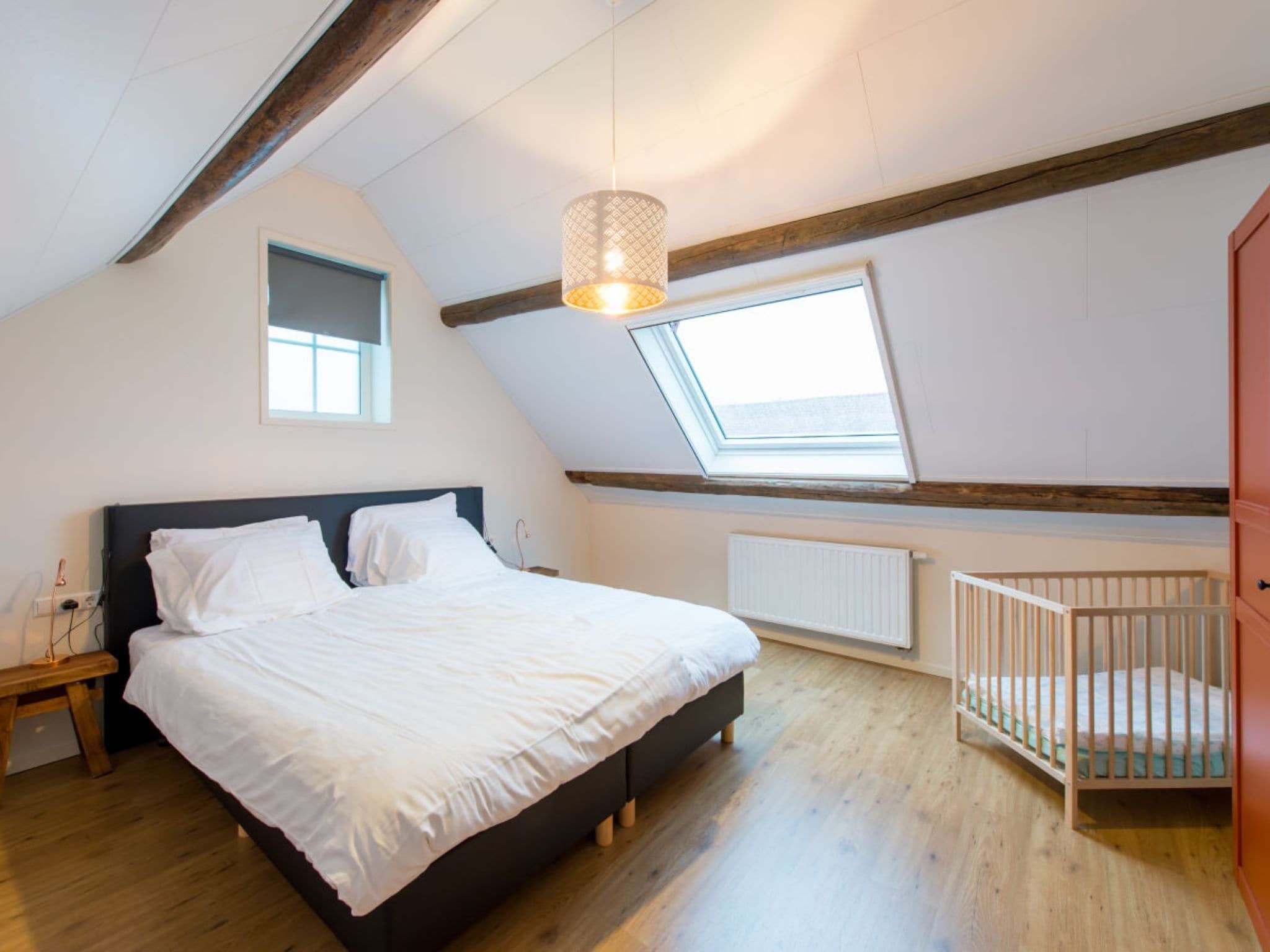 Een slaapkamer van Zoutelandseweg 2 Biggekerke in Biggekerke