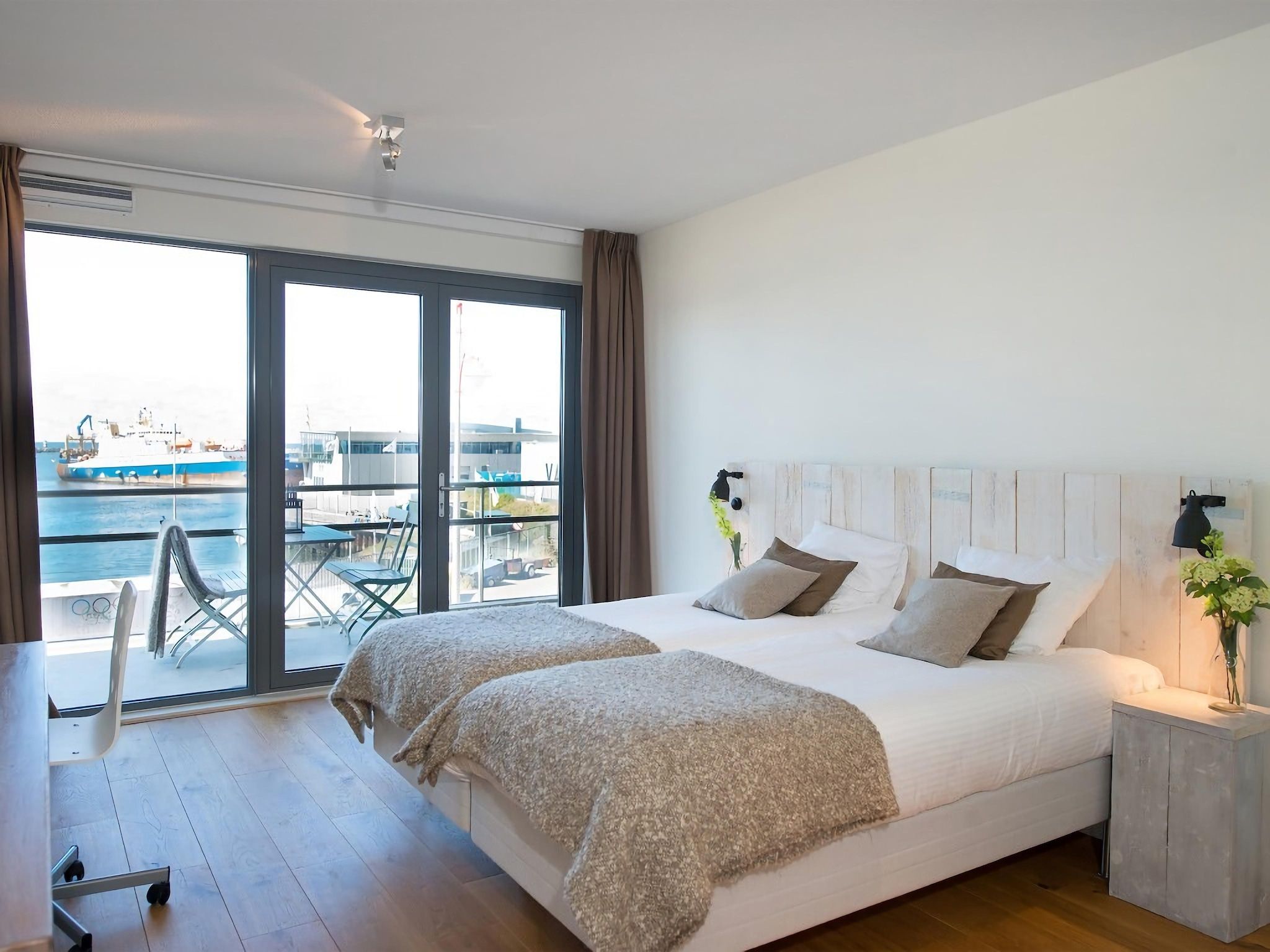 Een slaapkamer van Scheveningen Harbour 36 in Den Haag