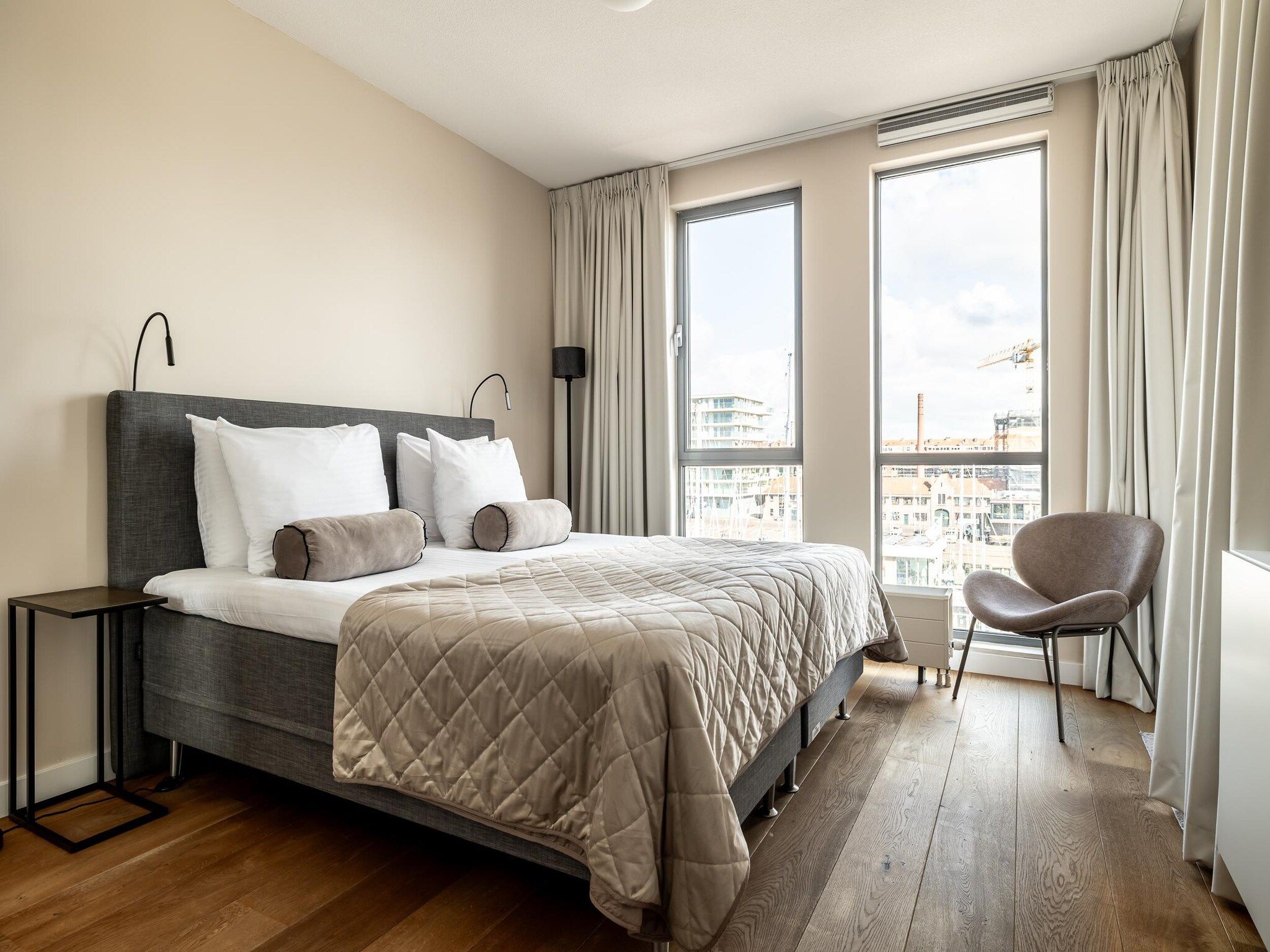 Een slaapkamer van Scheveningen Harbour 38C in Den Haag