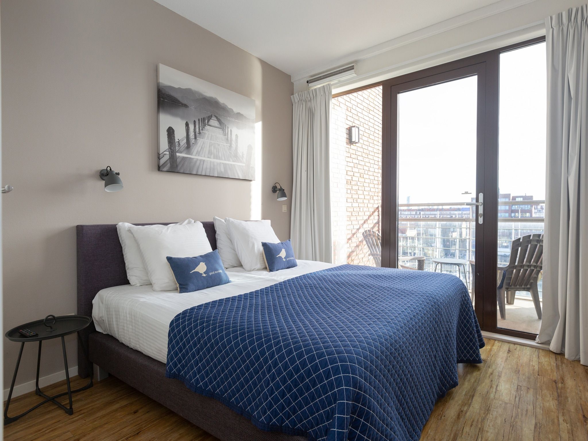 Een slaapkamer van Scheveningen Harbour 50A in Den Haag