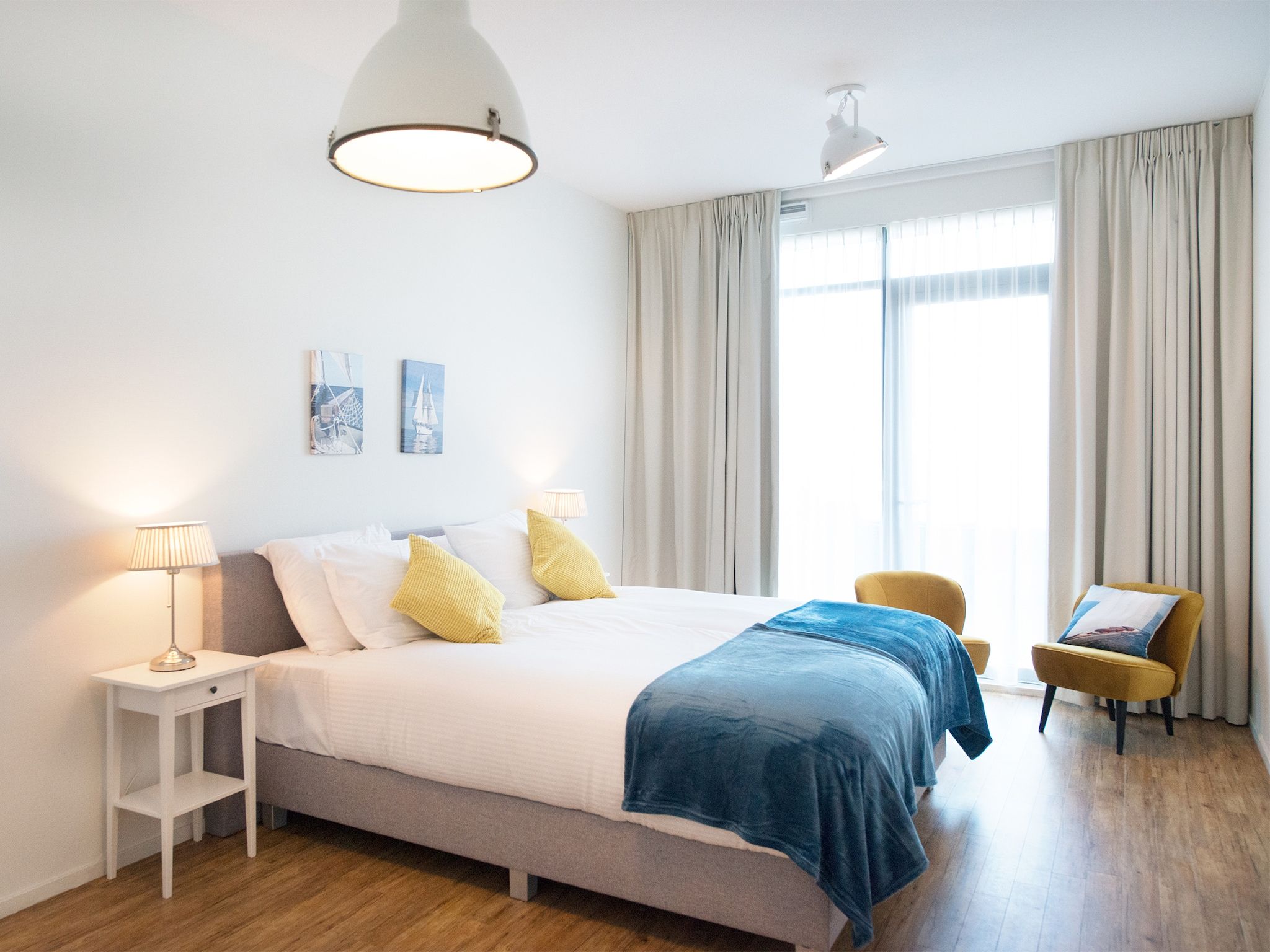 Een slaapkamer van Scheveningen Harbour 54 in Den Haag
