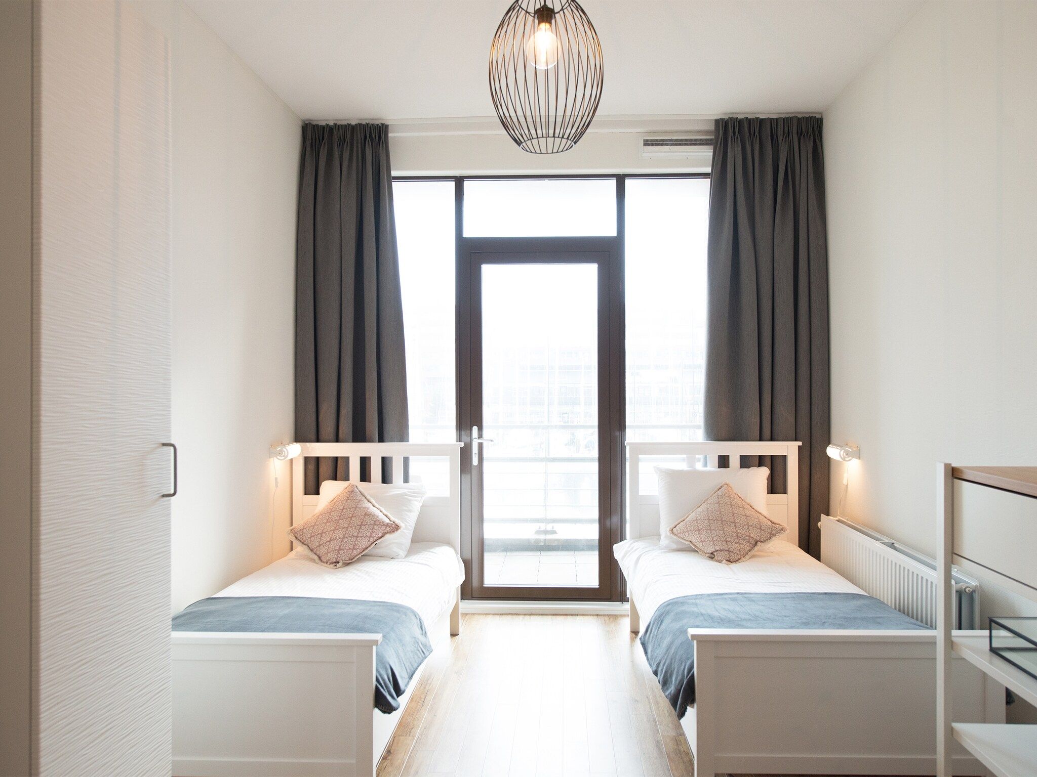 Een slaapkamer van Scheveningen Harbour 54A in Den Haag