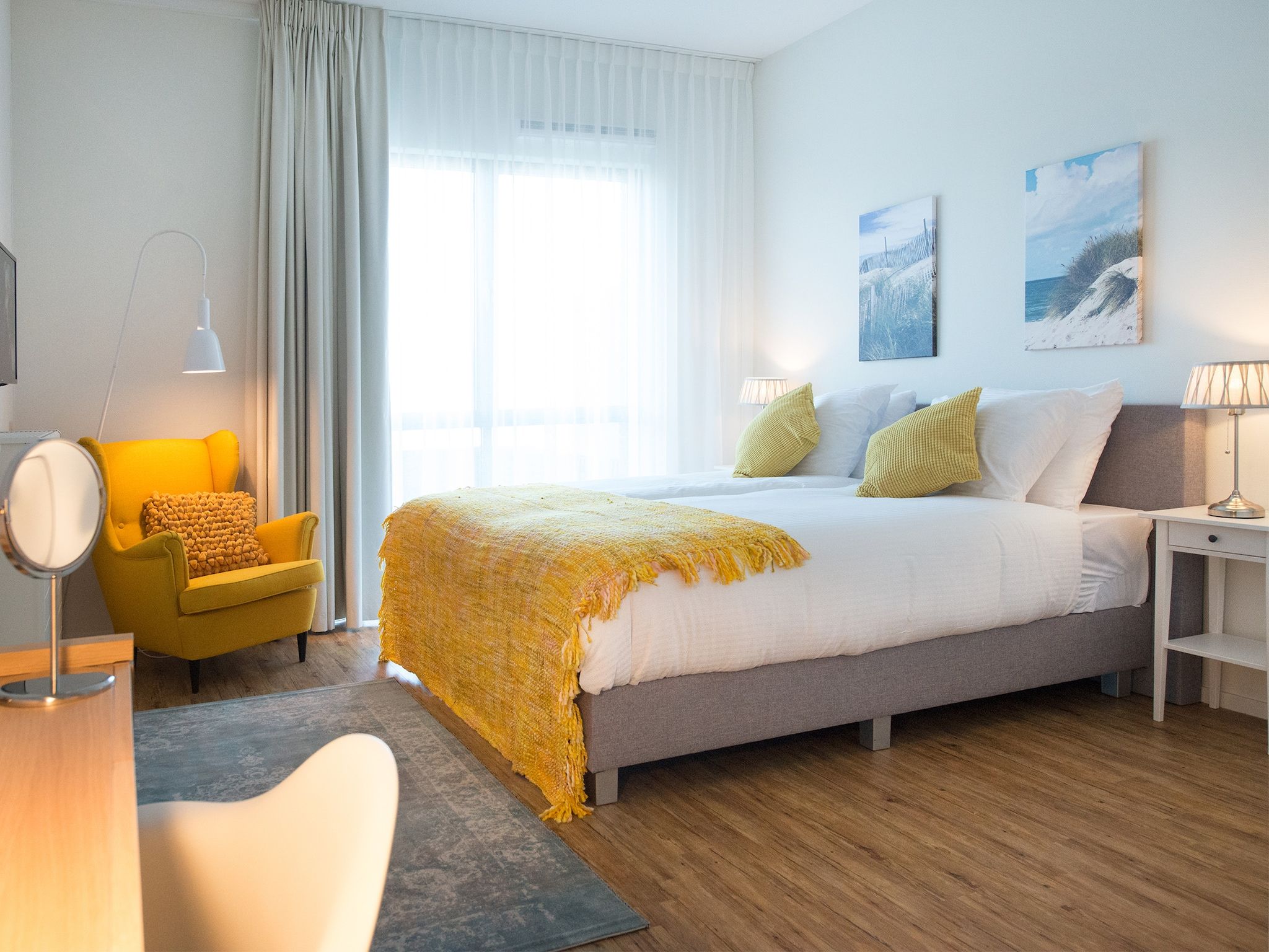 Een slaapkamer van Scheveningen Harbour 56D in Den Haag